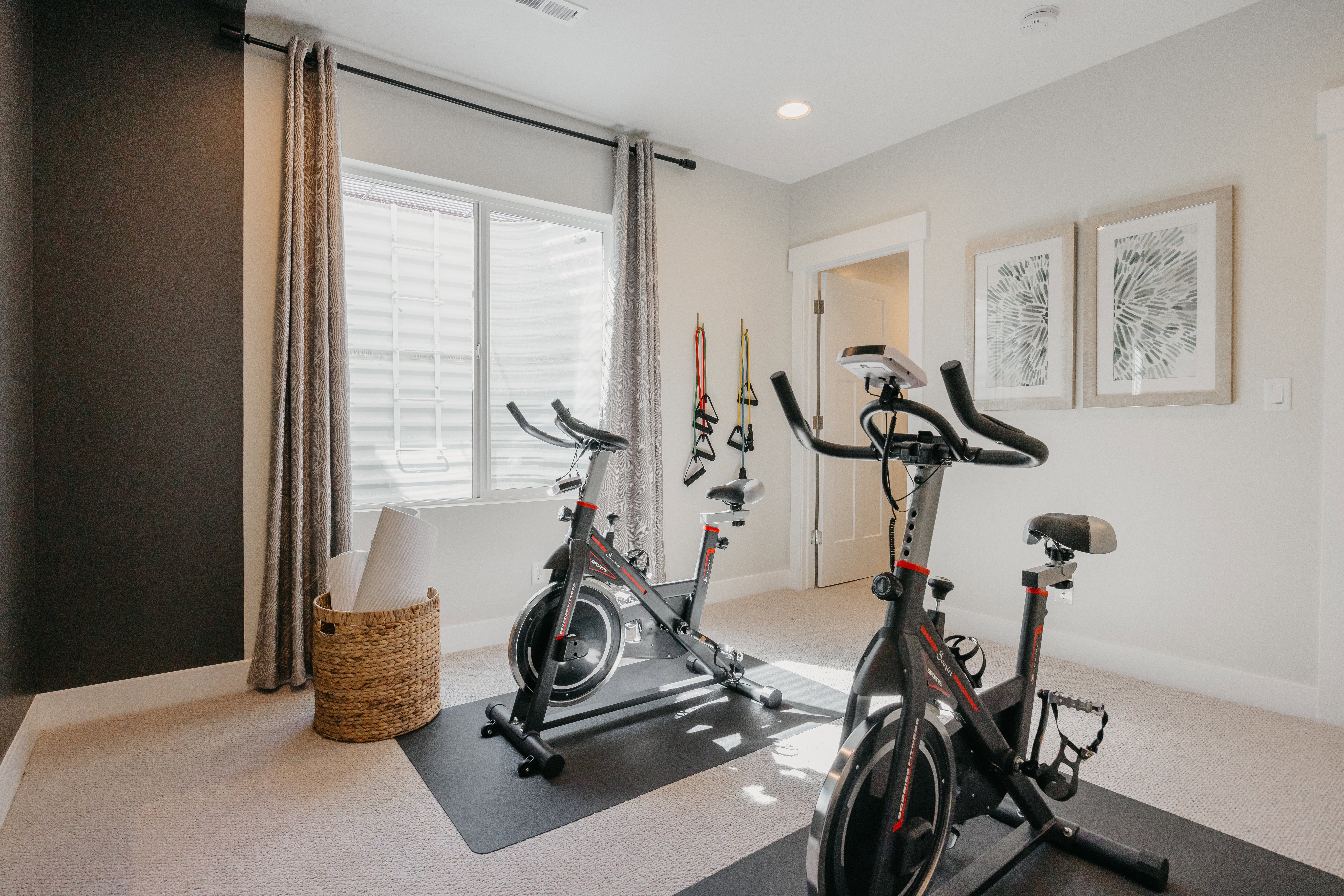Room featuring plush carpeting, a window with horizontal blinds and drapes, and a recessed light fixture