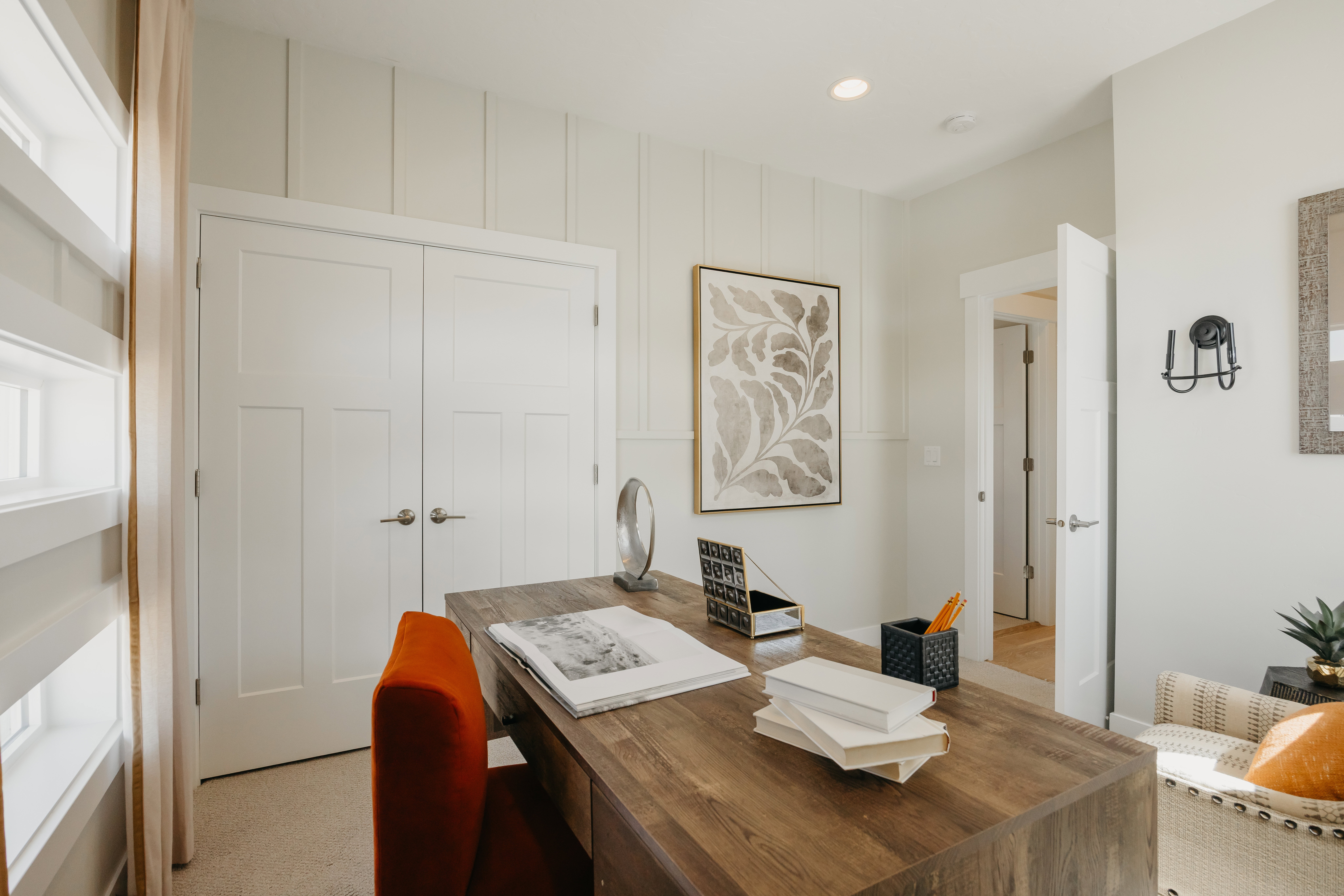 Board and batten accent wall with recessed lighting