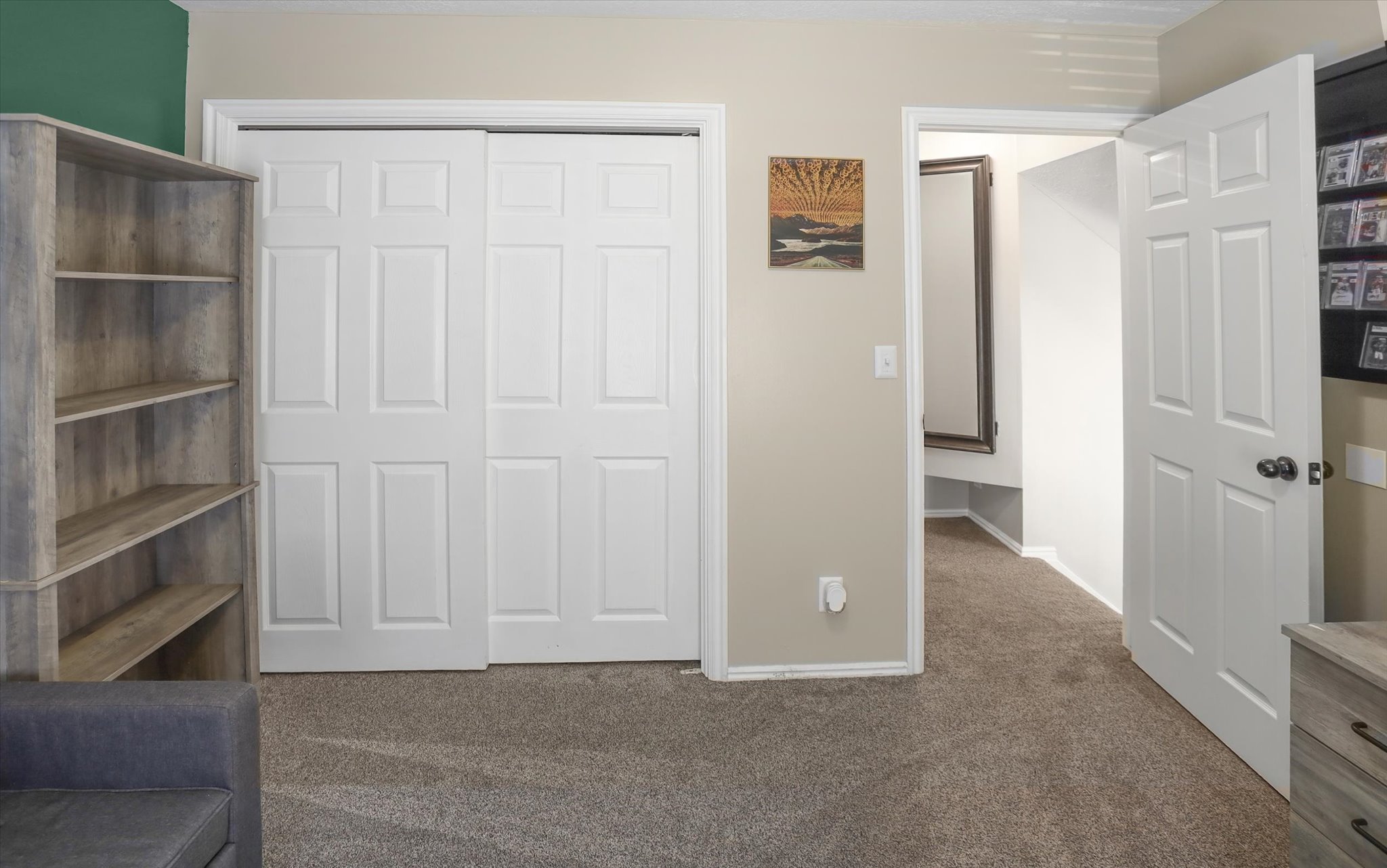 Plush carpeted flooring complementing neutral wall tones