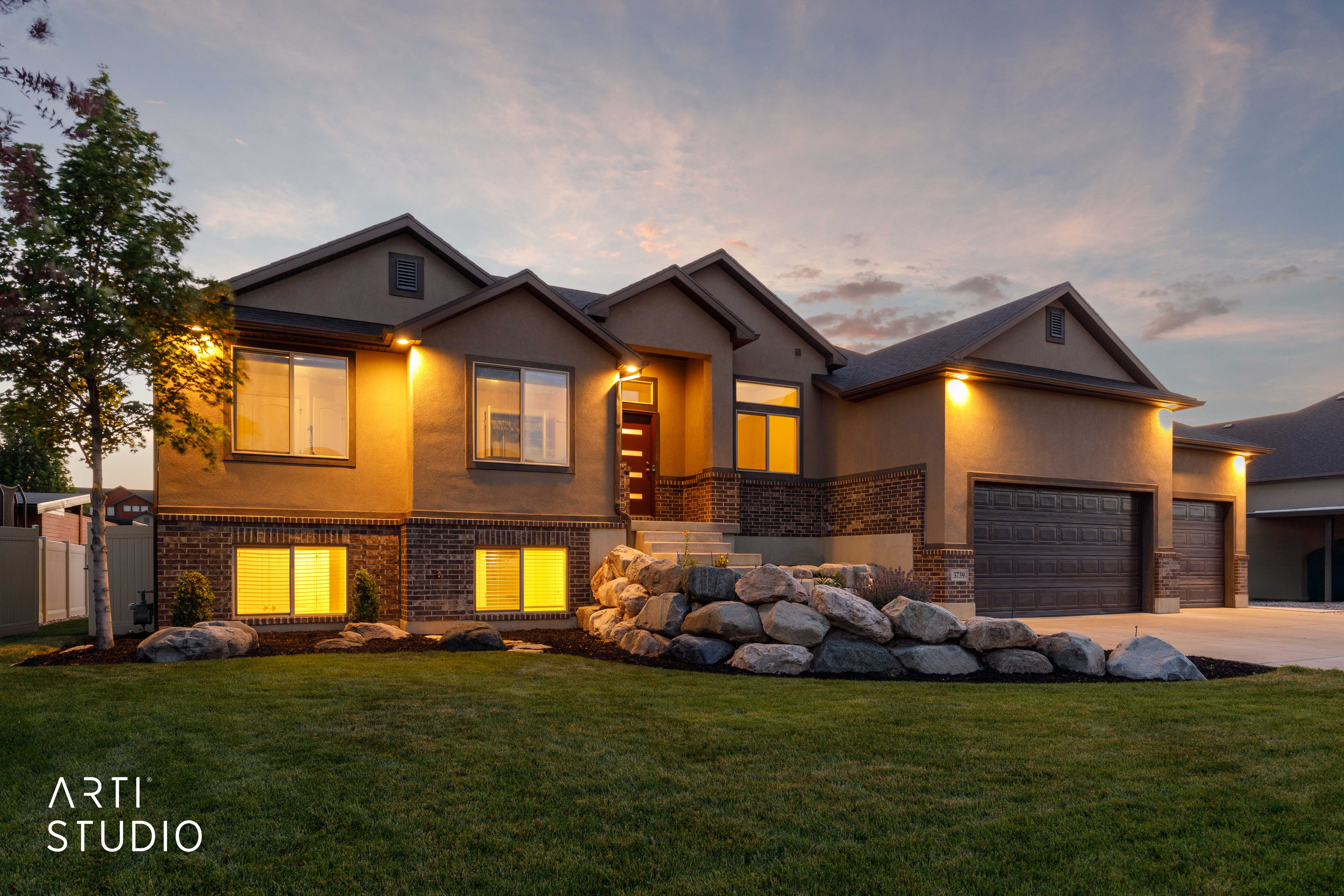 Contemporary exterior featuring stucco and brick accents