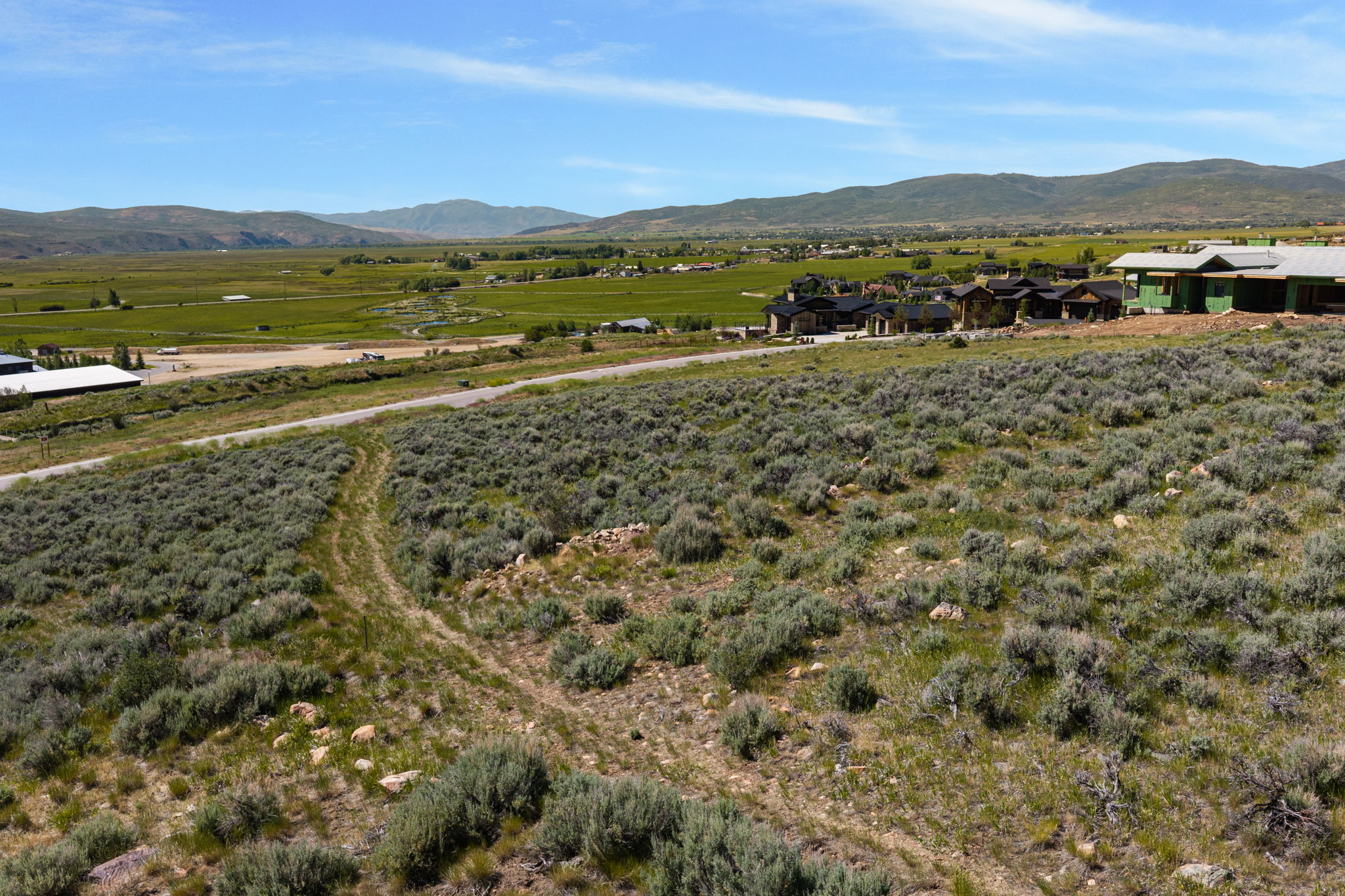 Expansive undeveloped lot with natural sagebrush landscaping