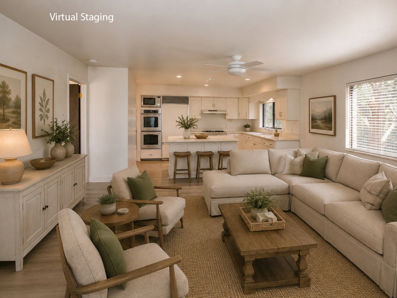 Open-concept living space with light wood-finish flooring