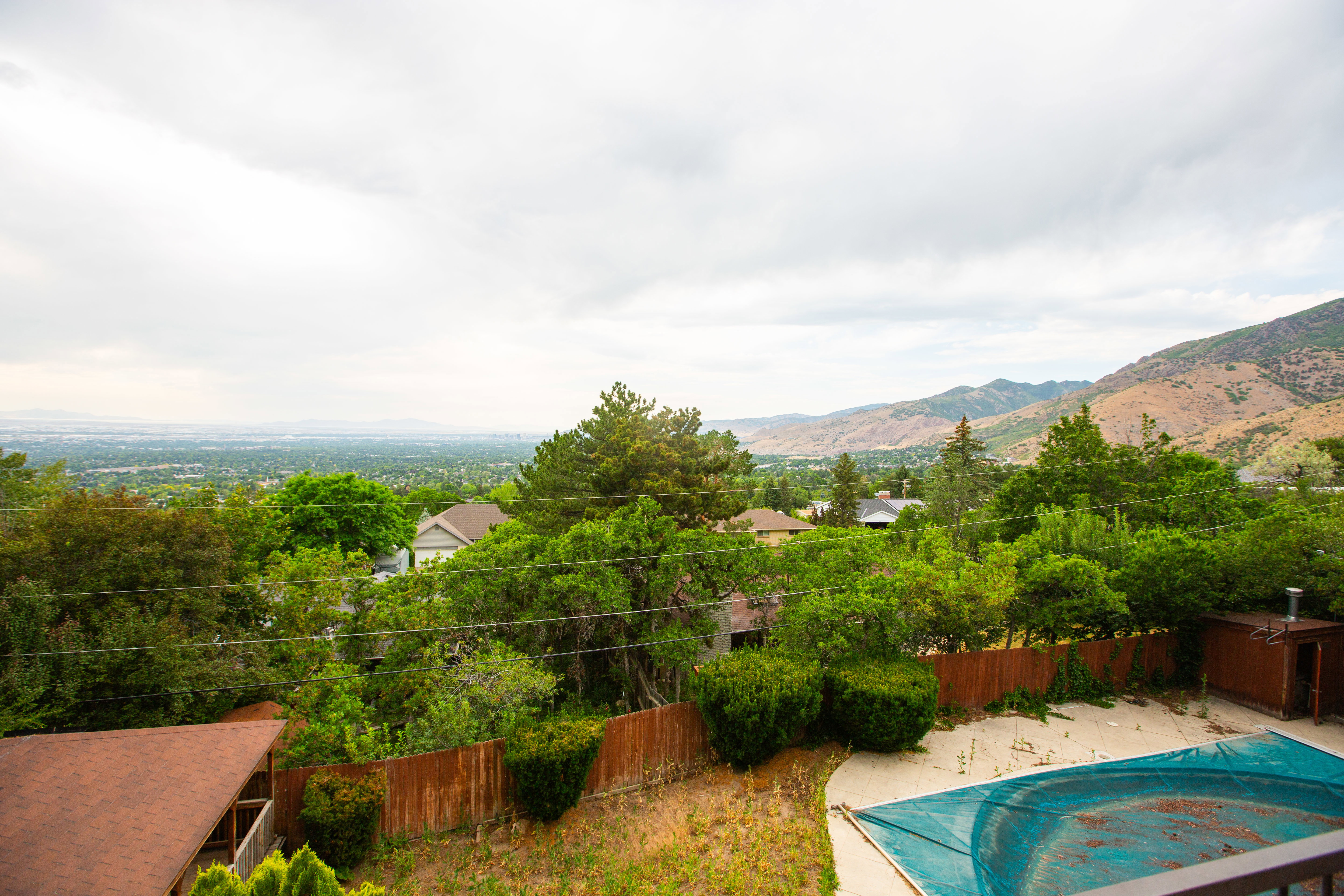 View from the deck with mountain backdrop, and distant cityscape
