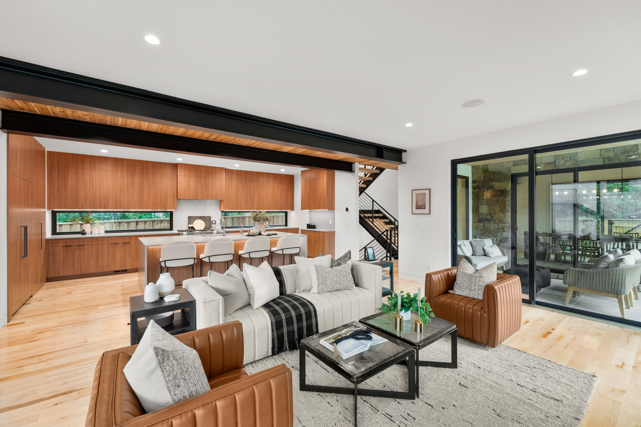 Open-concept living space featuring light wood-finish flooring throughout
