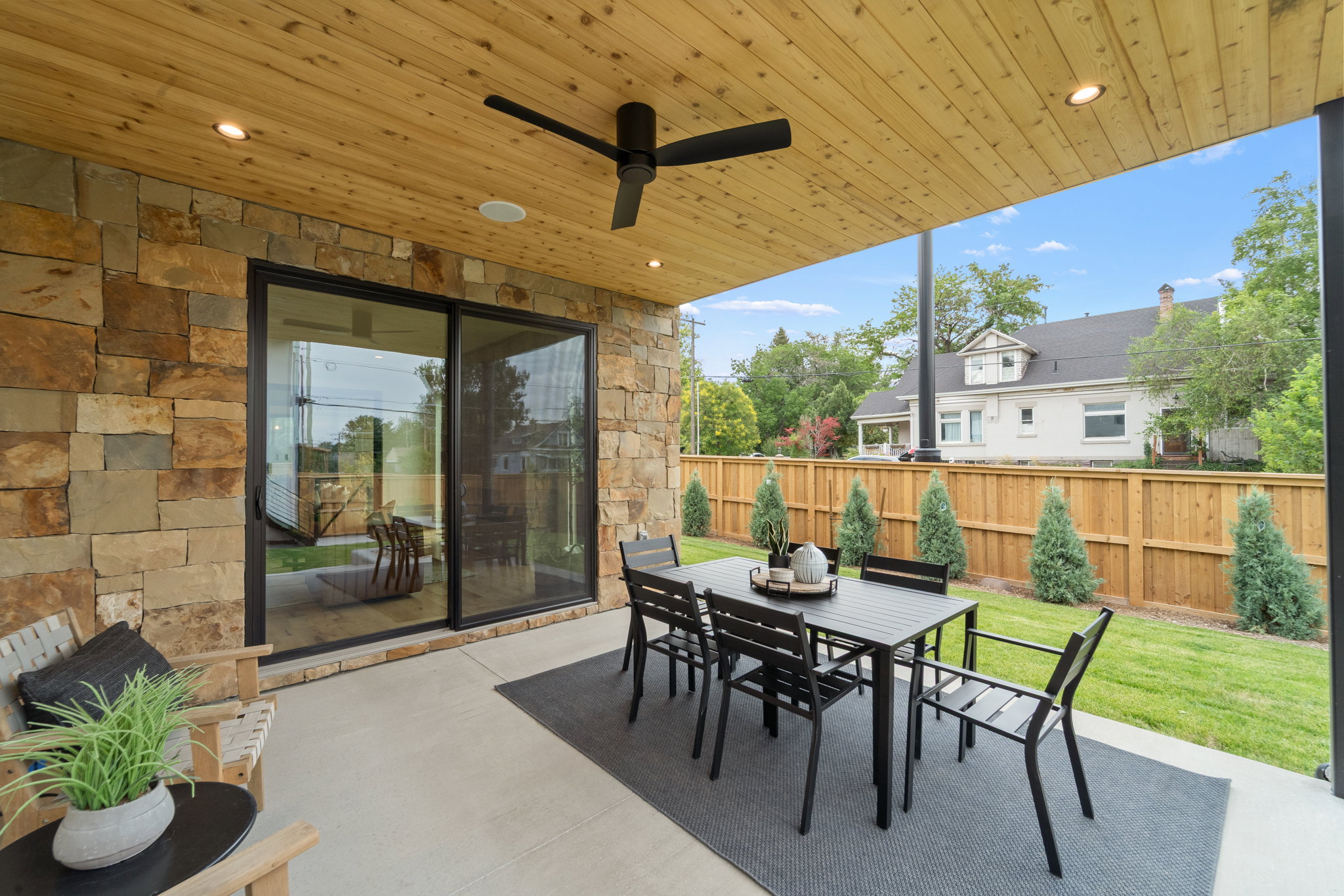 Covered patio featuring a wood-finish ceiling, recessed lighting, and a ceiling fan