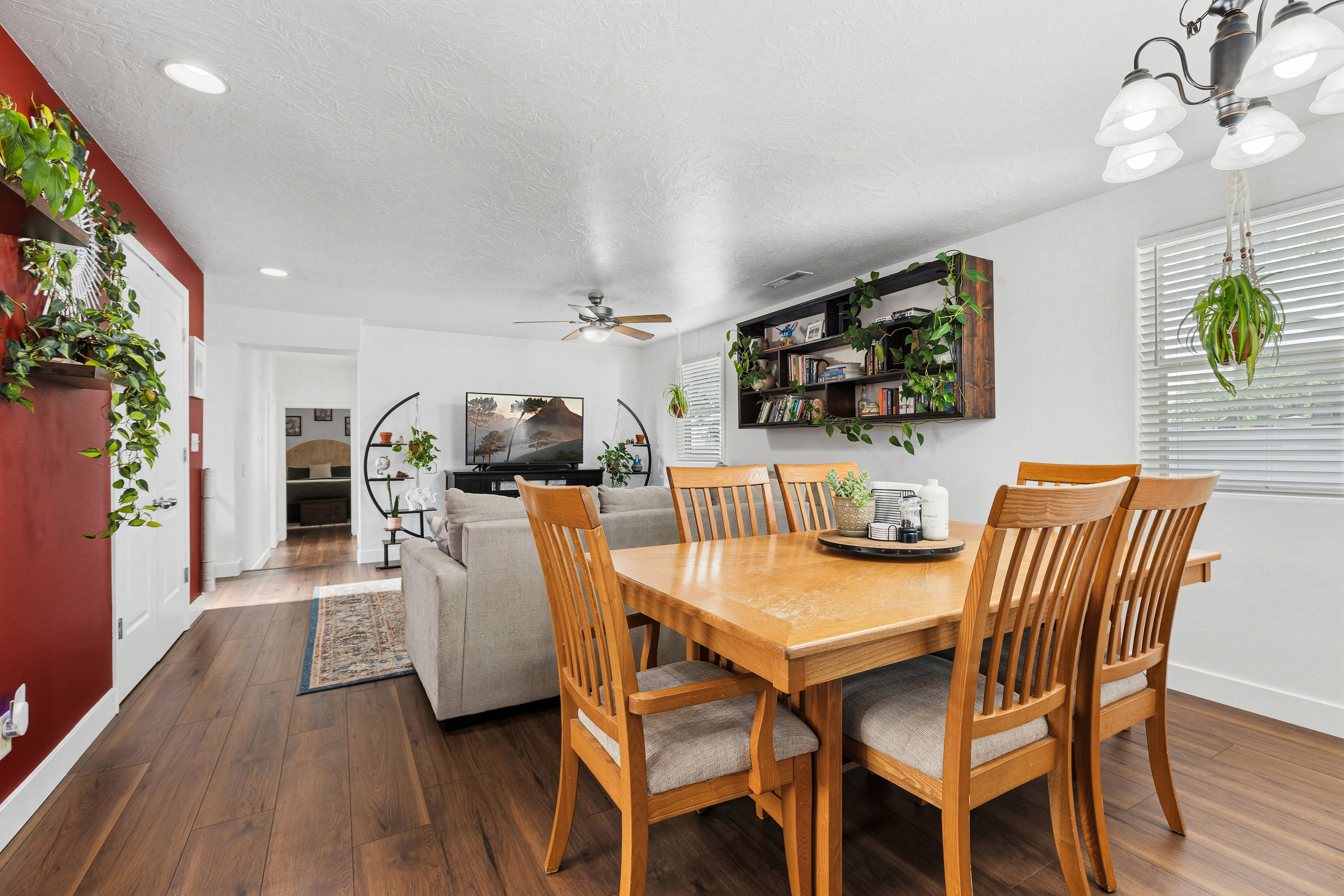 Open concept living space featuring wood-finish flooring throughout