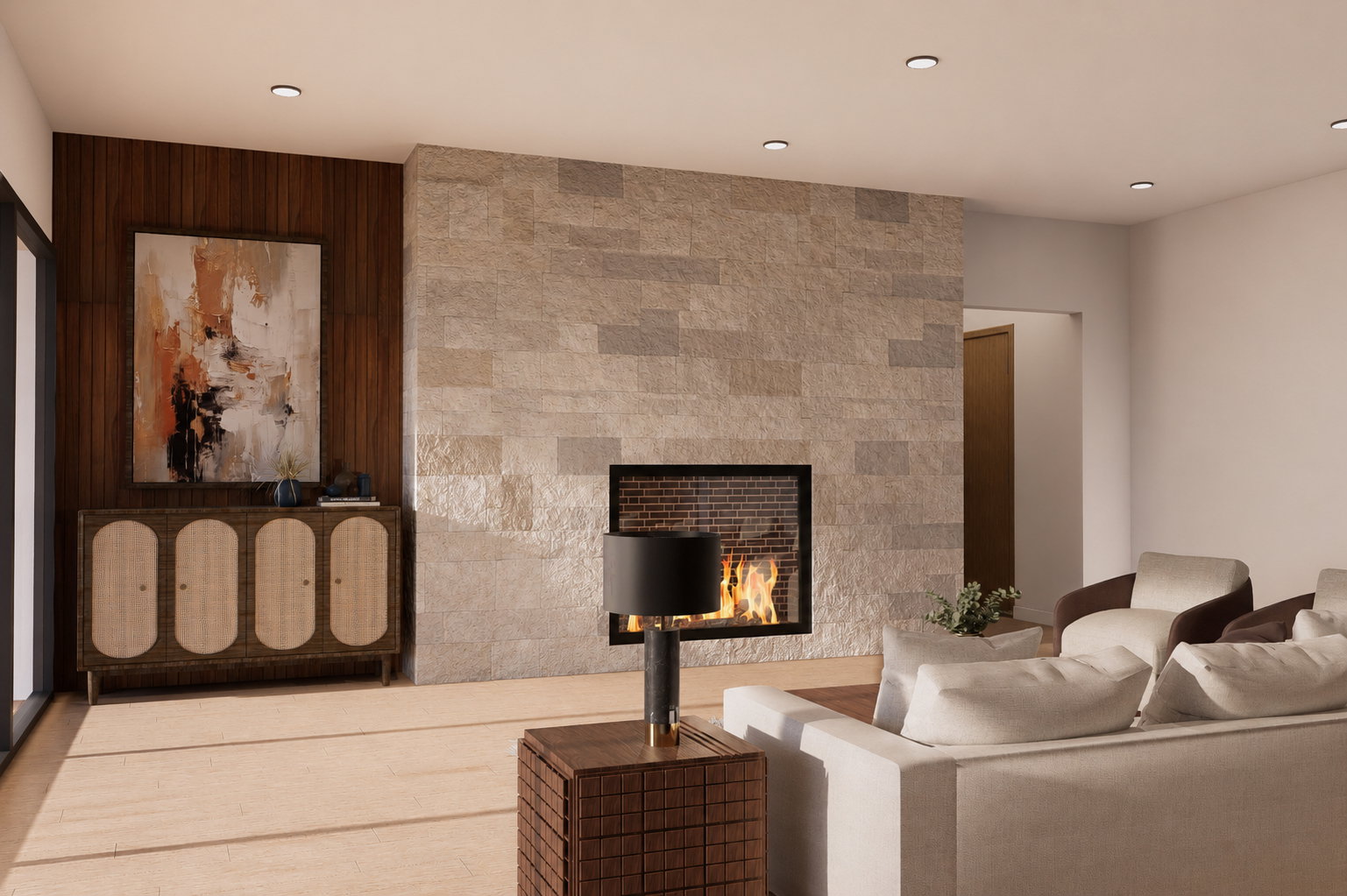 Recessed lighting illuminates a stone-clad fireplace with a black surround