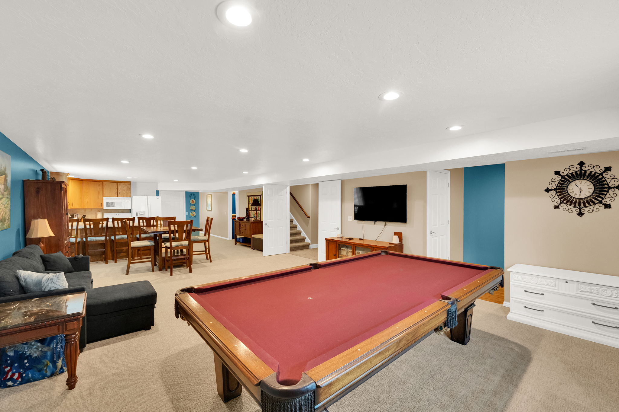 Spacious recreational room featuring a billiards table, recessed lighting, and carpeting throughout