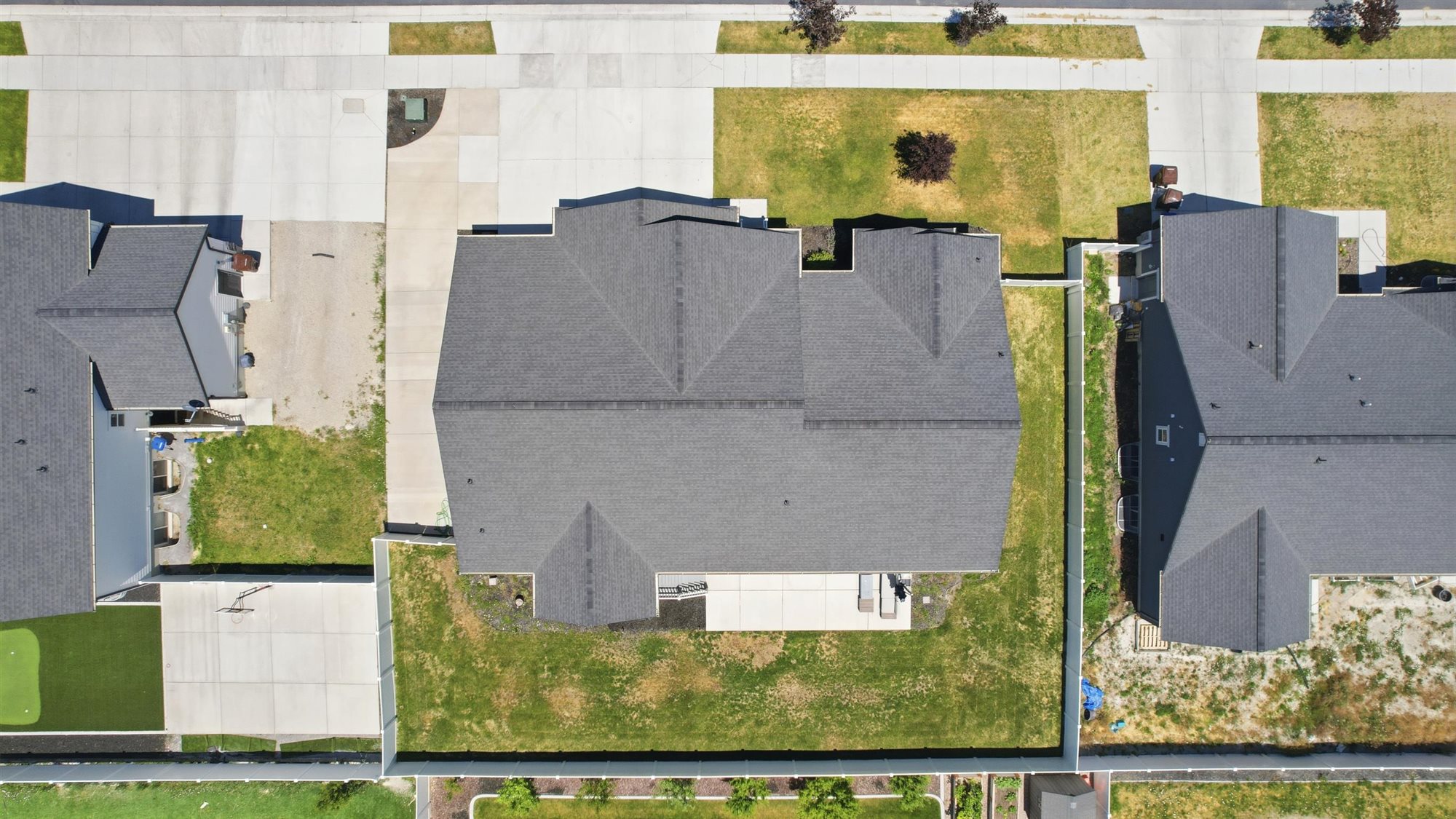 Roofline featuring dark gray shingles