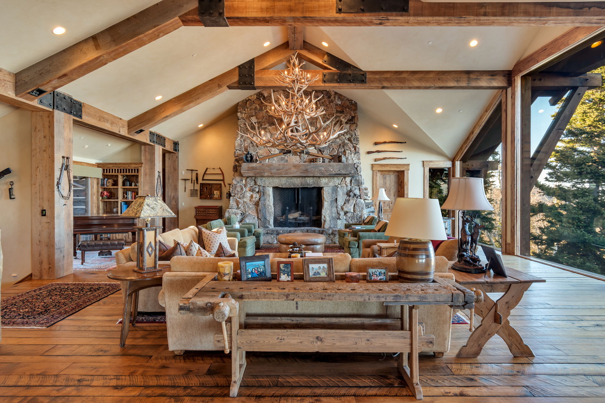 Vaulted ceilings with exposed wood beams define this spacious room