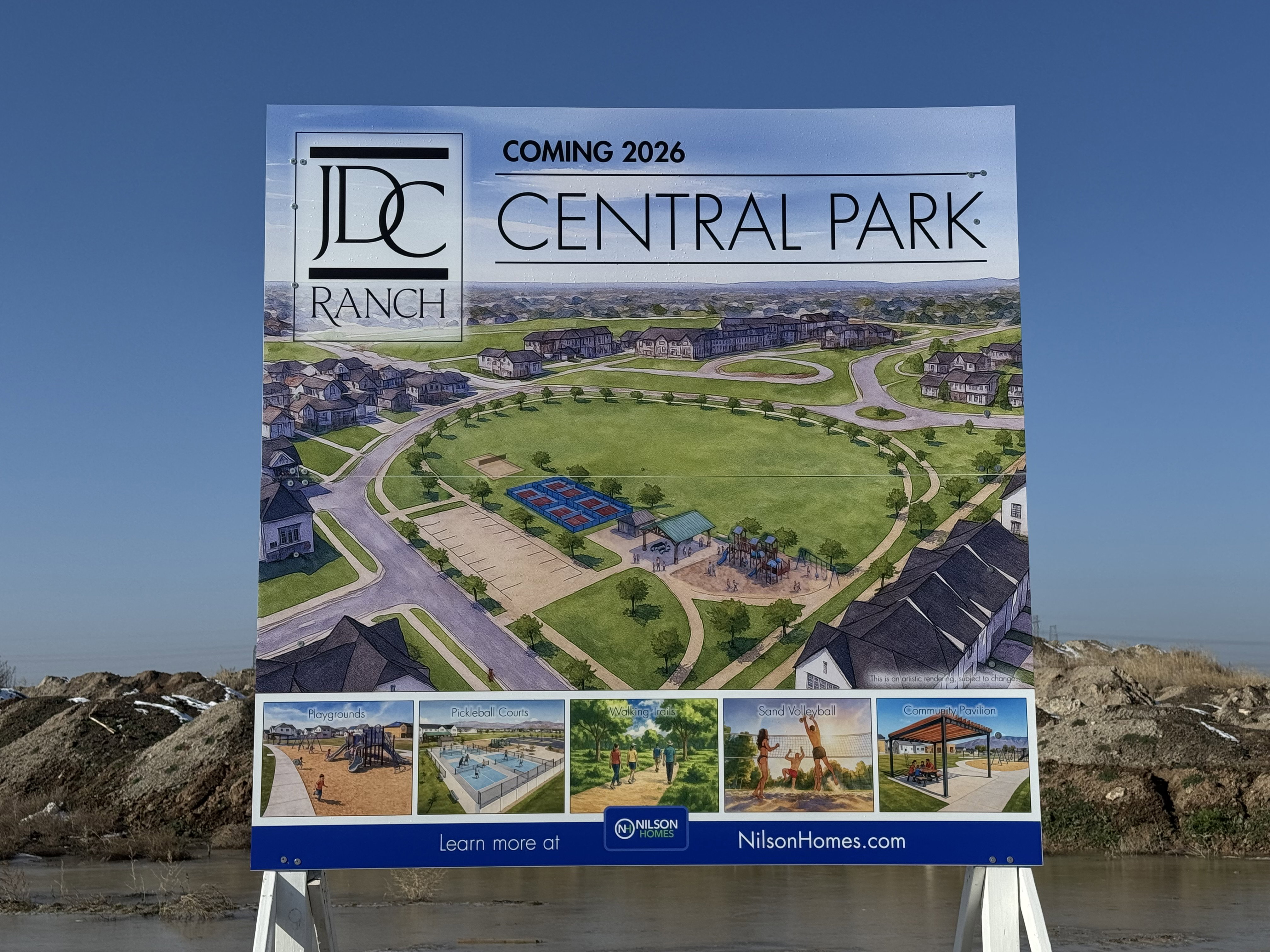 Development Project Signage. Displaying a rendering of the upcoming Central Park property and amenities, with completion projected for 2026