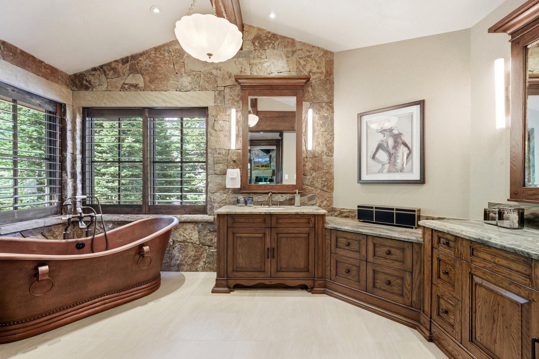 Freestanding copper bathtub with a wall-mounted faucet, framed by large windows with plantation shutters