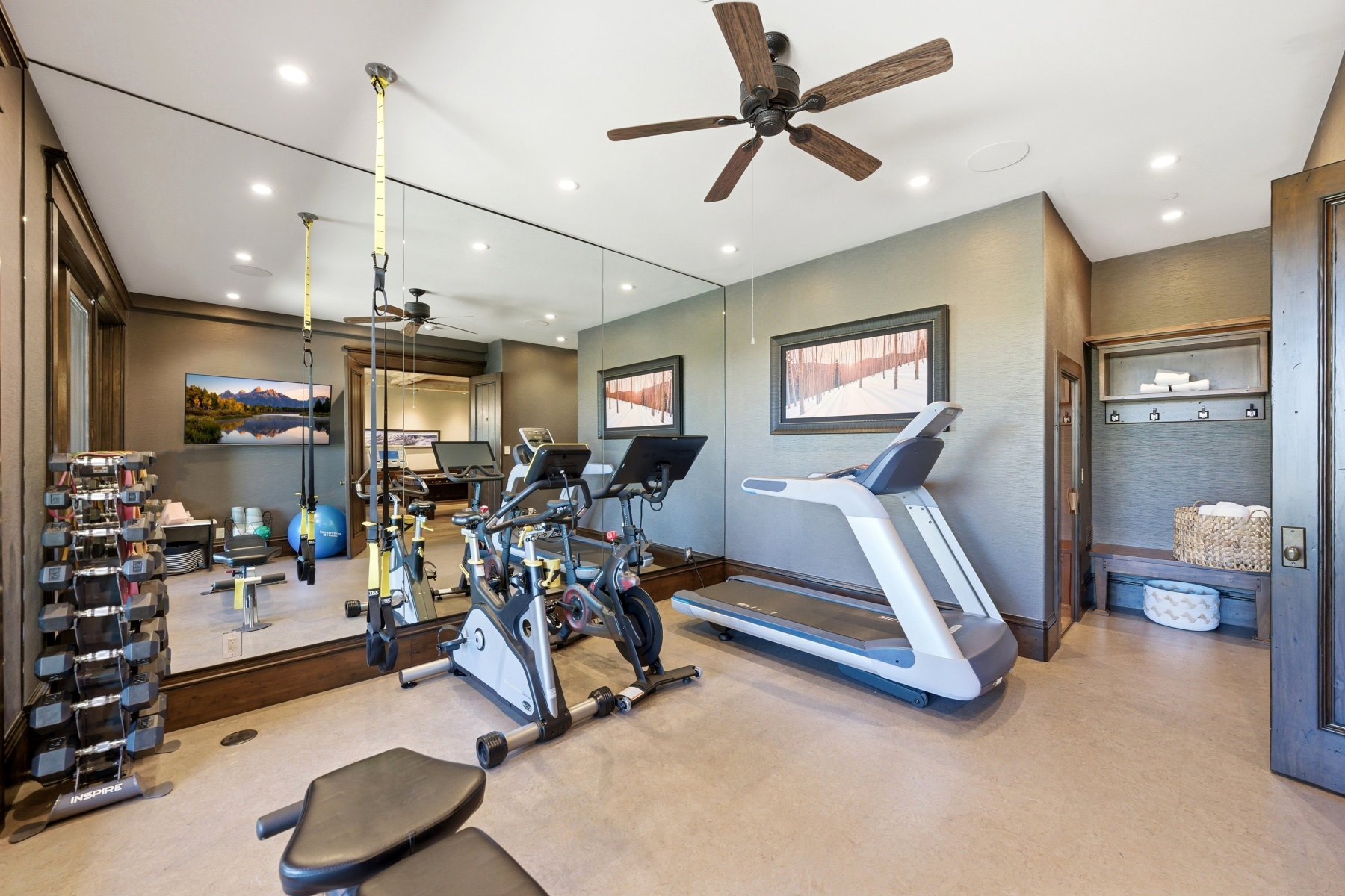 Dedicated fitness space featuring a full-length mirrored wall, recessed lighting, and a ceiling fan