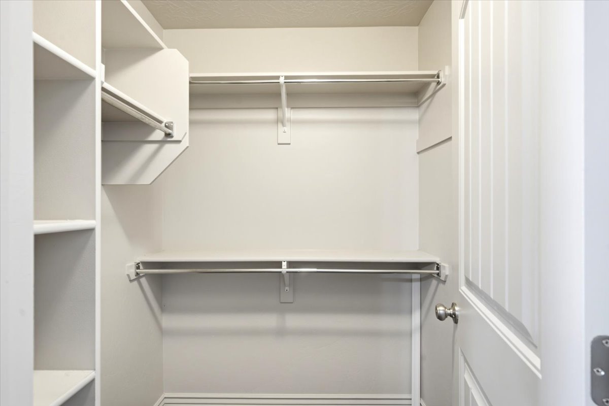 Primary Bedroom Walk-in Closet