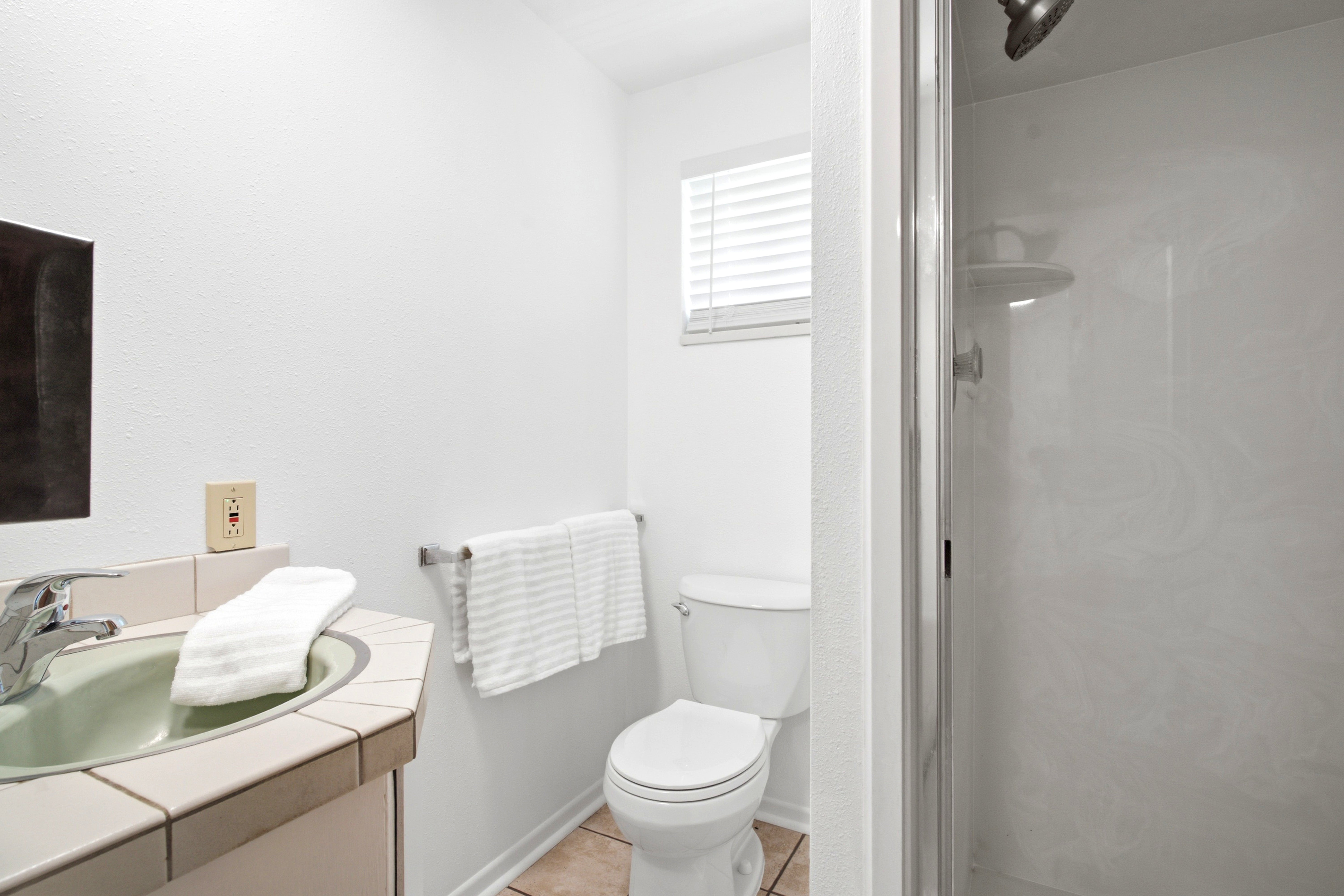 Primary bedroom with ensuite bathroom