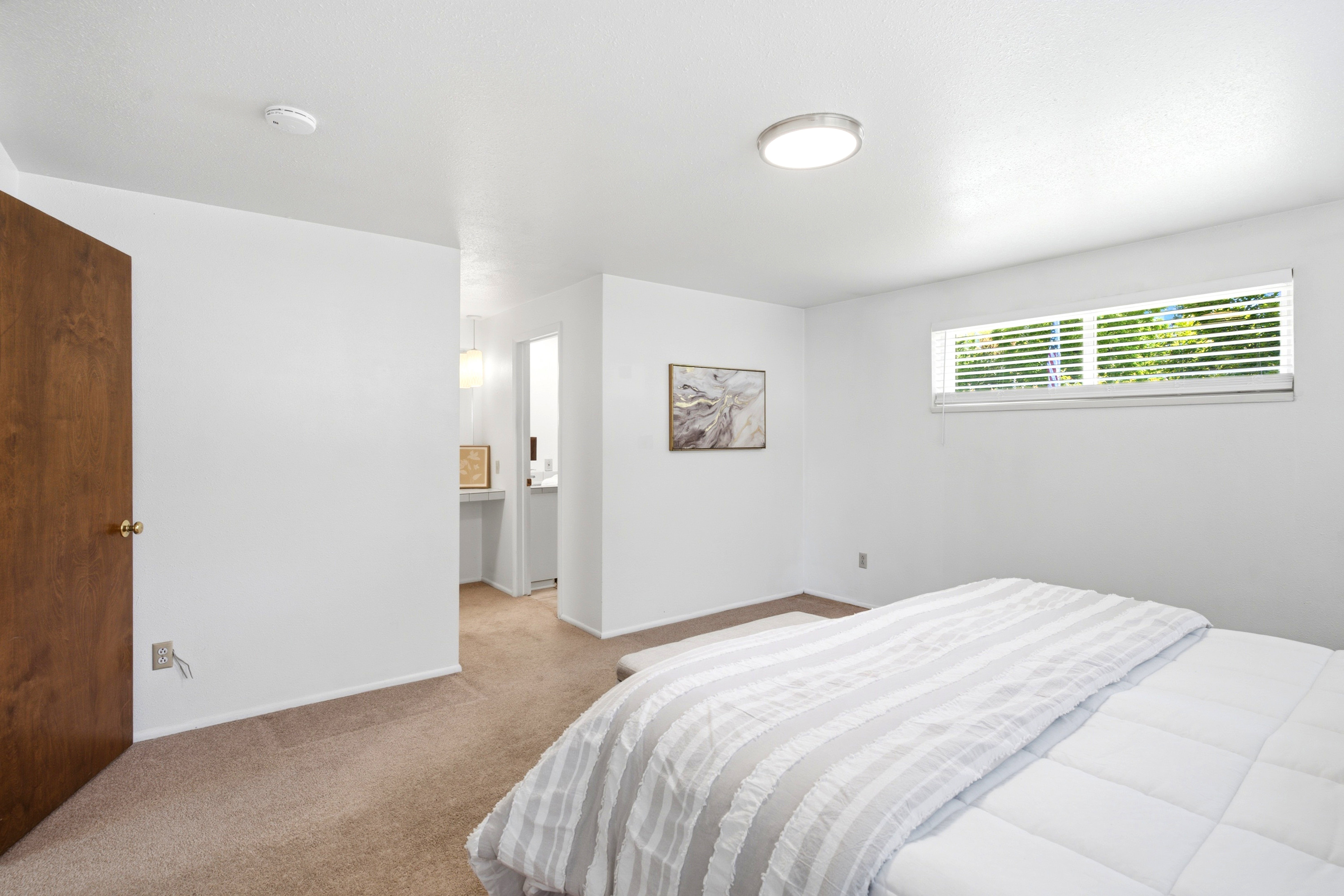 Primary bedroom with ensuite bathroom