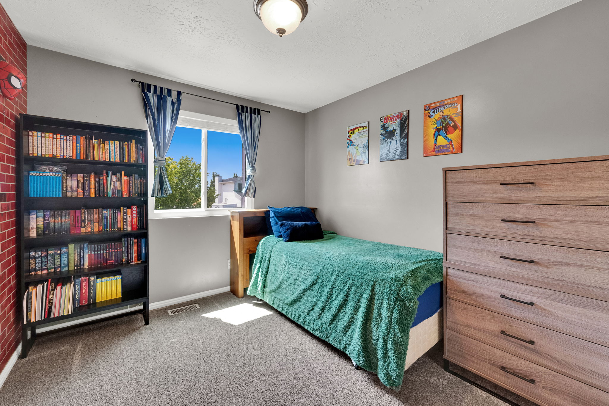Room featuring light gray walls, gray carpet flooring, and a single window with a white frame
