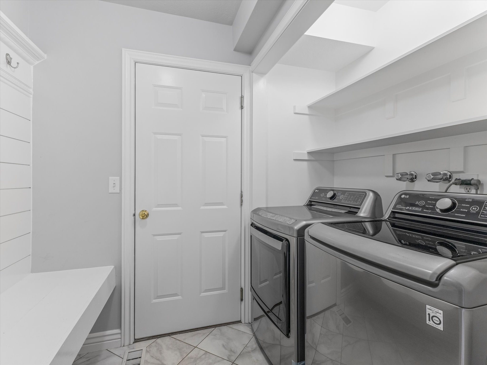Laundry room/mud room with garage entrance