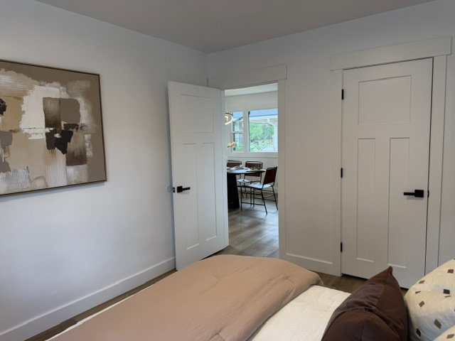 White interior doors with matte black hardware and matching trim