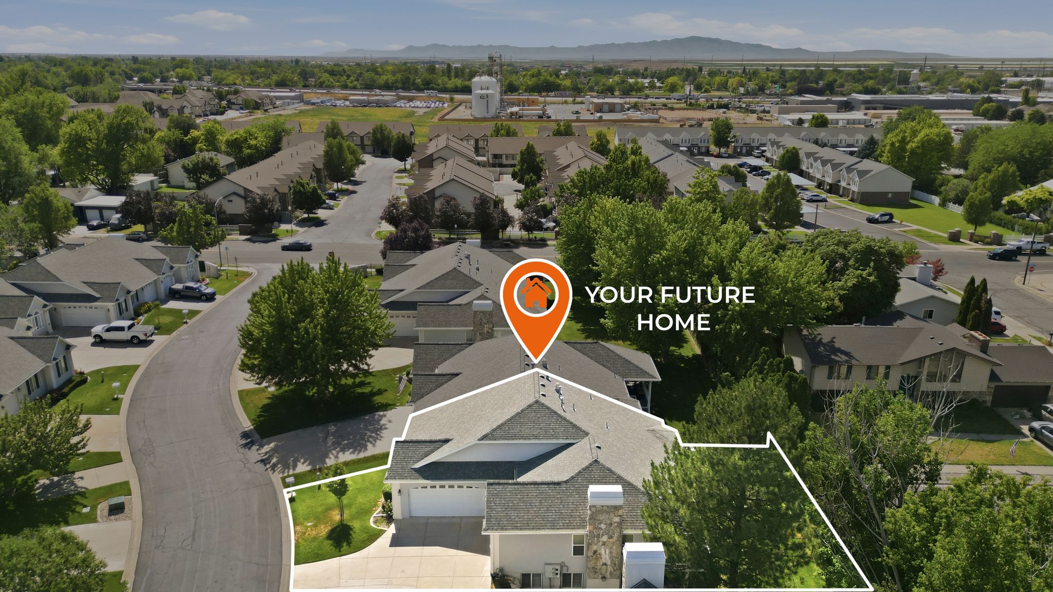 Single-family residence with an attached two-car garage, situated on a curved street within a residential area