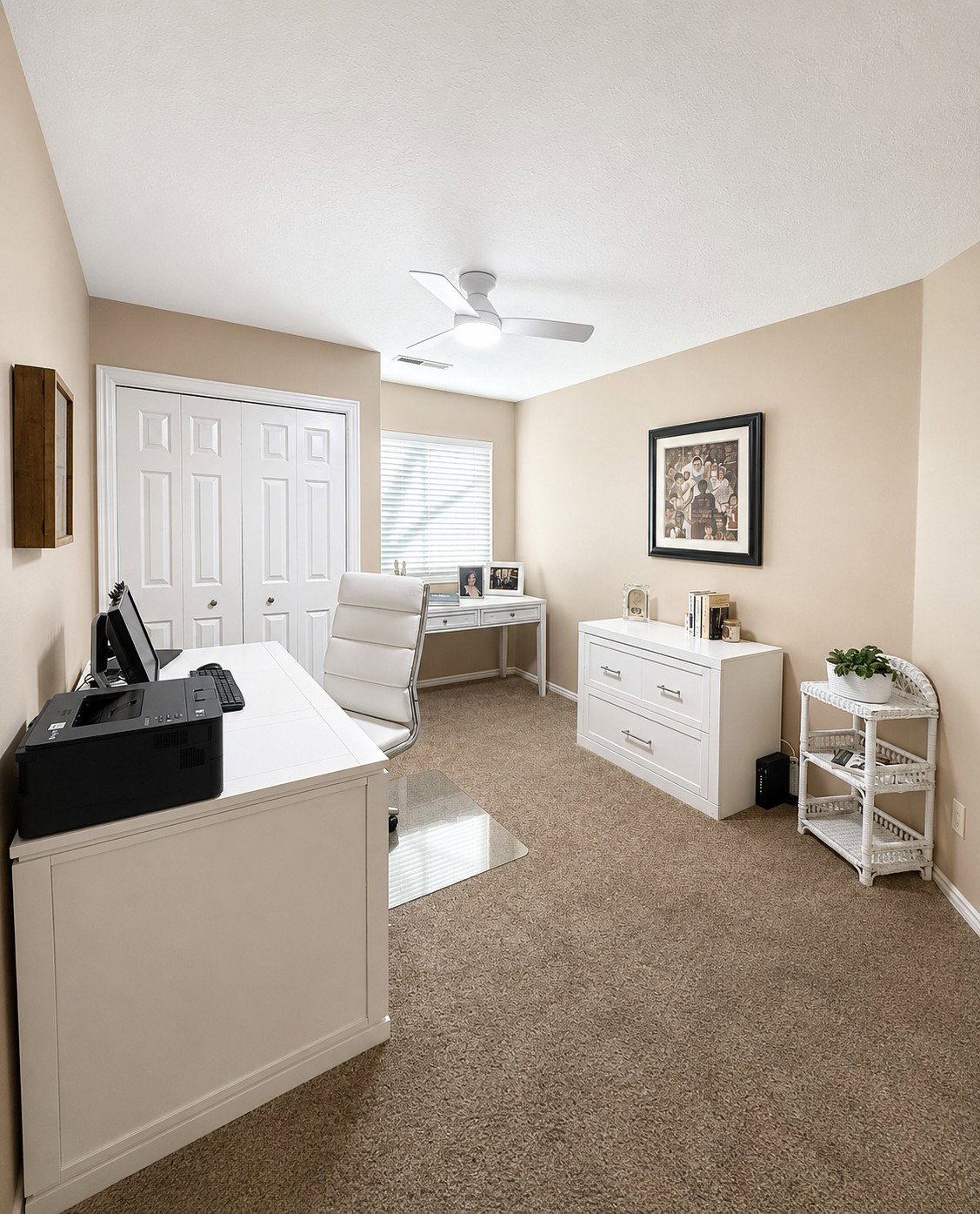 Carpeted interior room with neutral-toned walls