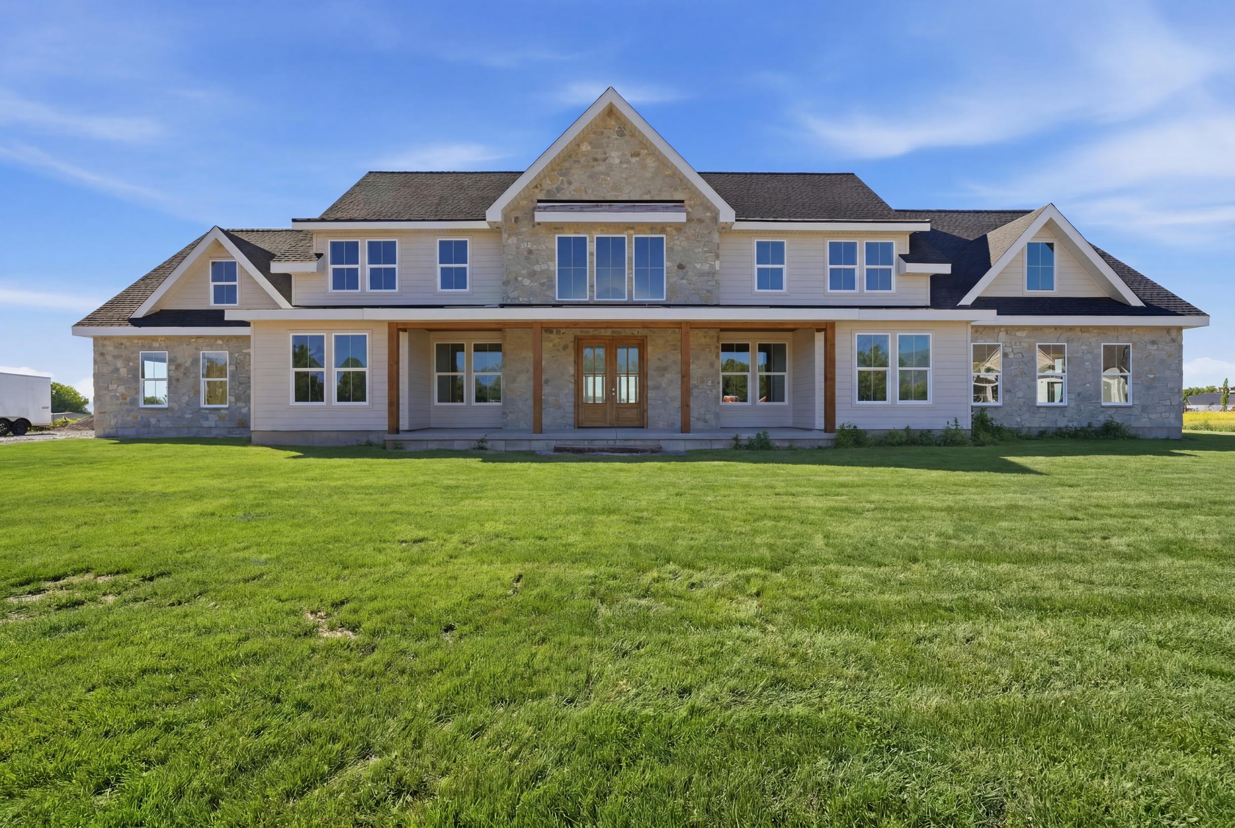 Stone and siding exterior with gabled roof lines