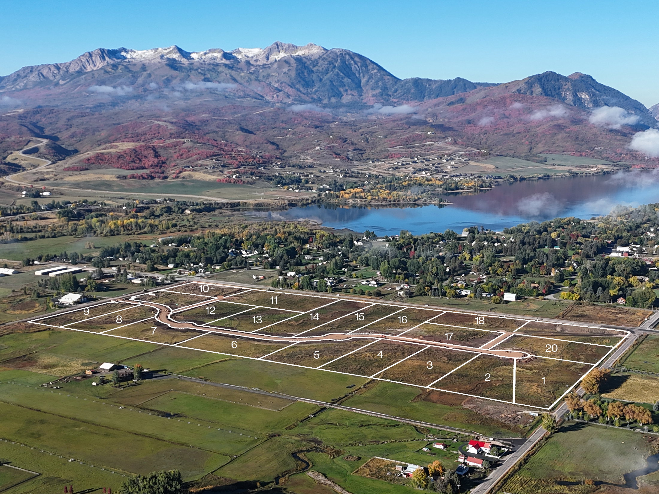 Aerial perspective showcasing a parcel of 20 delineated land lots