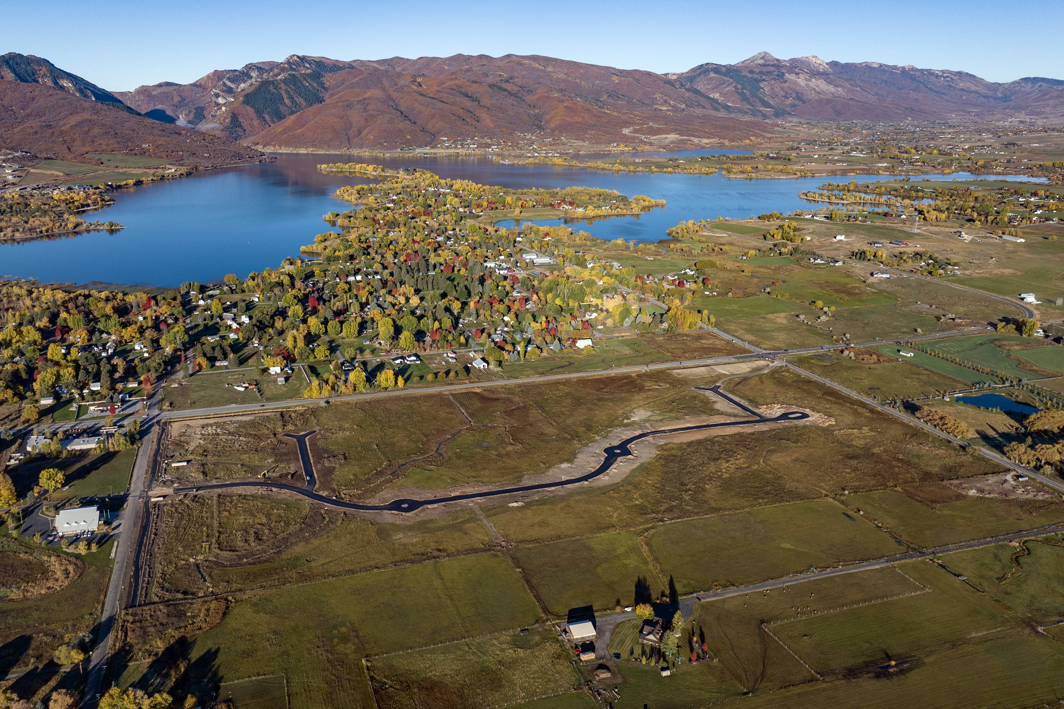 Expansive land parcel featuring new road infrastructure and a distinct cul-de-sac