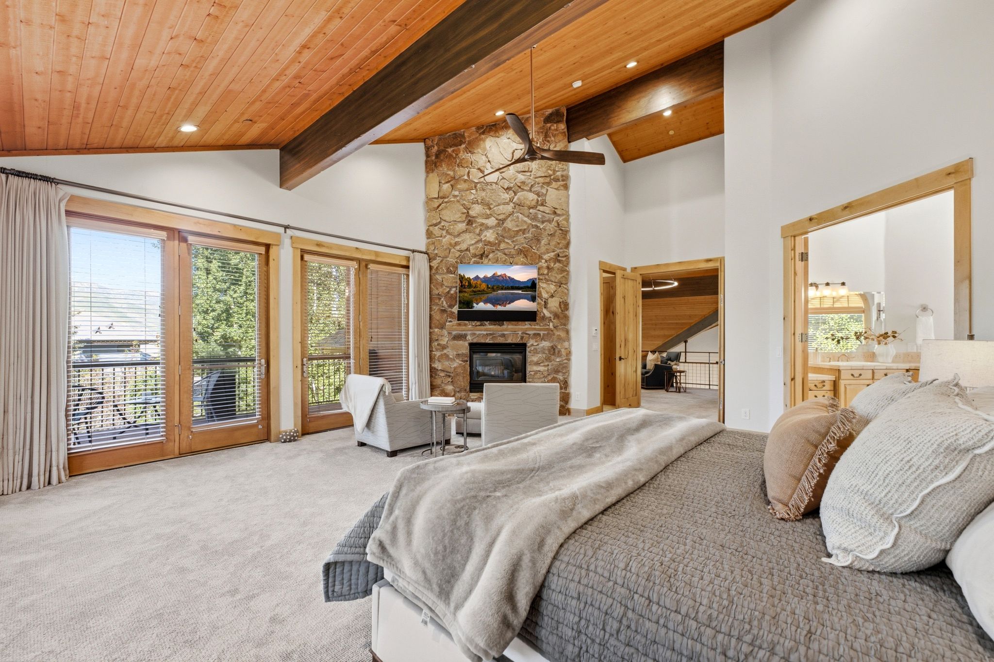 Vaulted wood-paneled ceiling with exposed beams