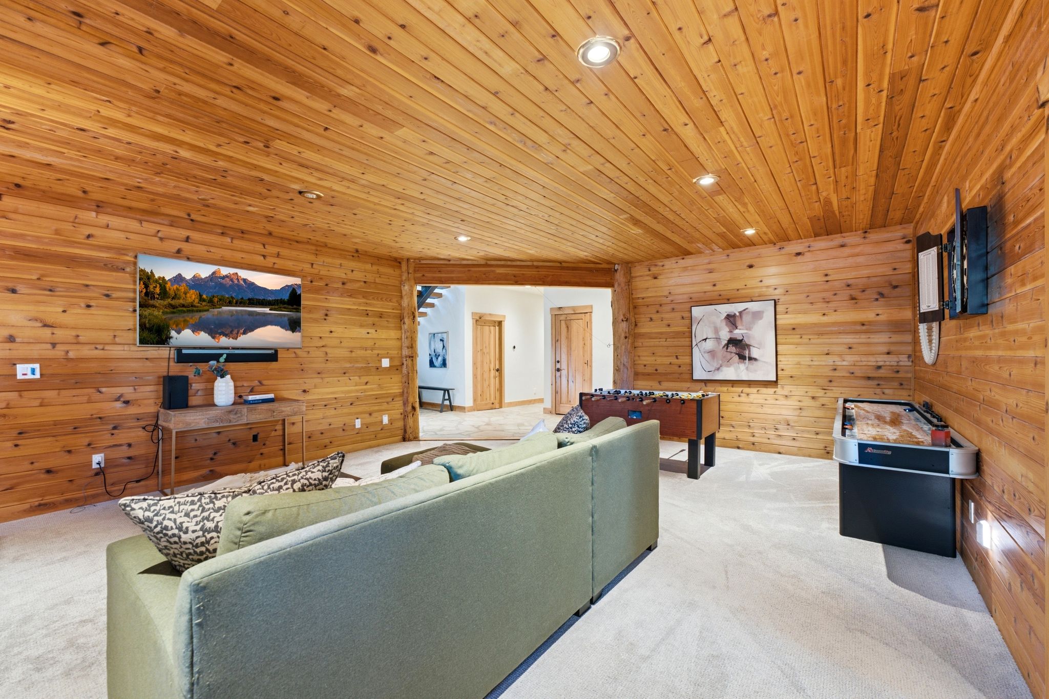 Wood-paneled walls and ceiling creating a cohesive aesthetic