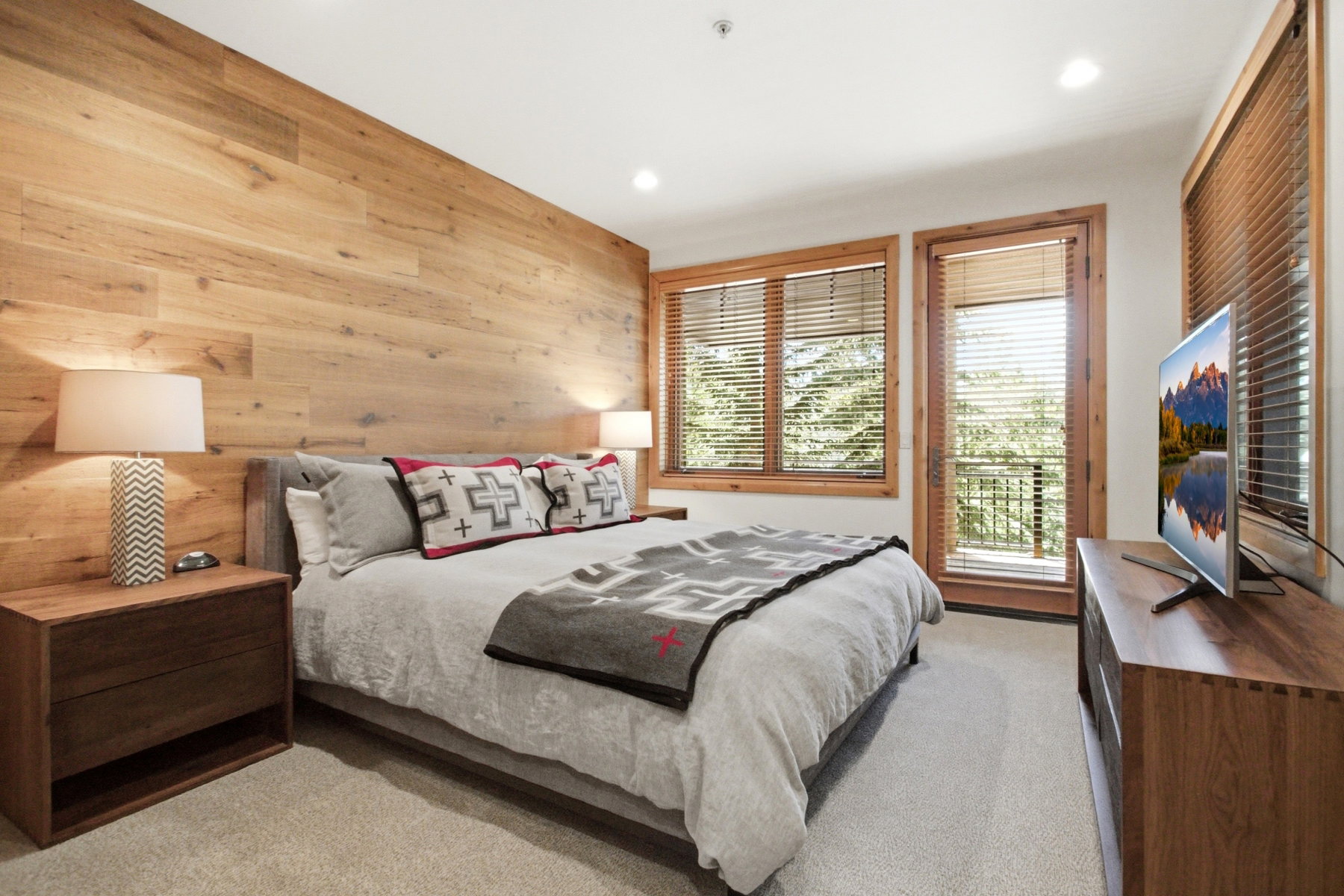 Wood-finish accent wall with recessed lighting