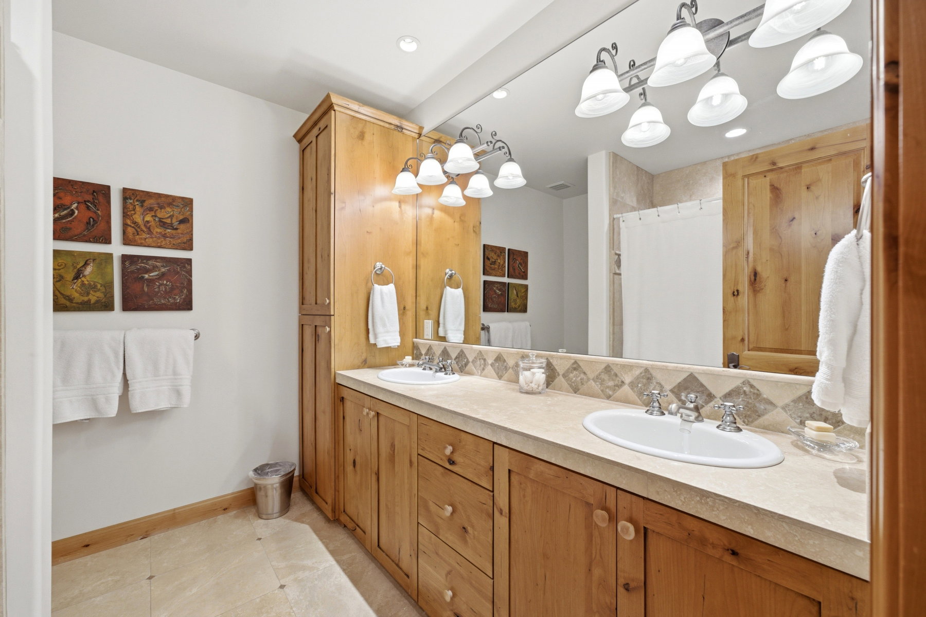 Dual vanity with integrated sinks and chrome fixtures