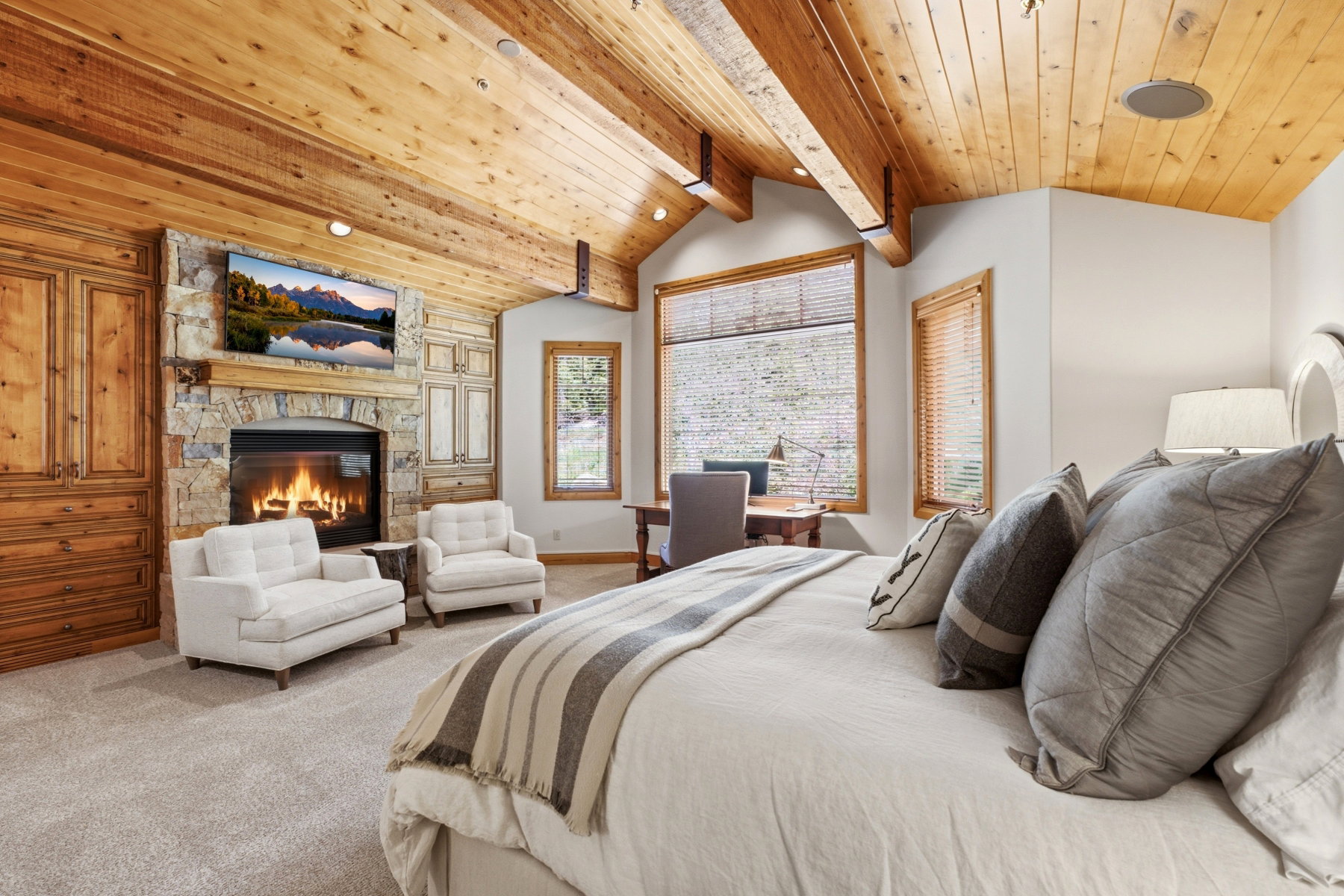 Vaulted wood-paneled ceiling with exposed beams