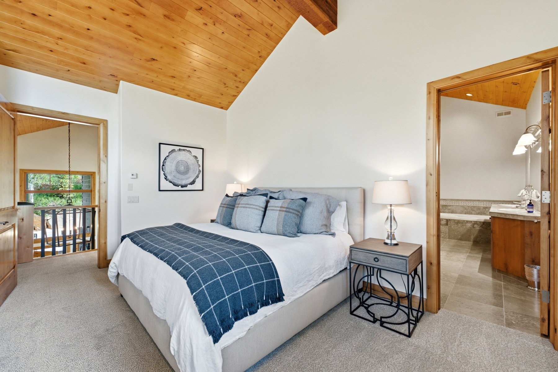 Vaulted wood-finish ceiling with exposed beams