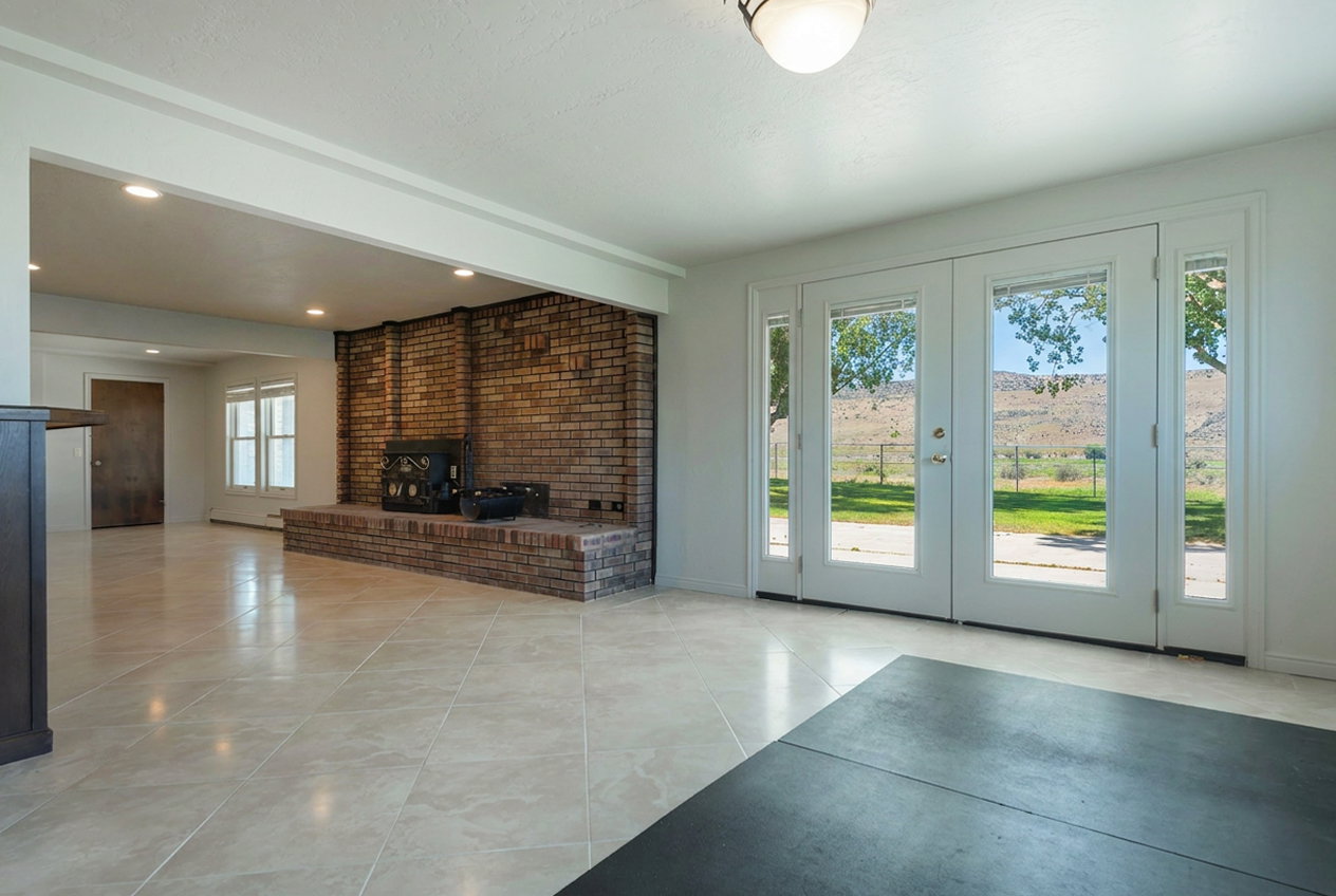 Spacious interior with light-toned tiled flooring