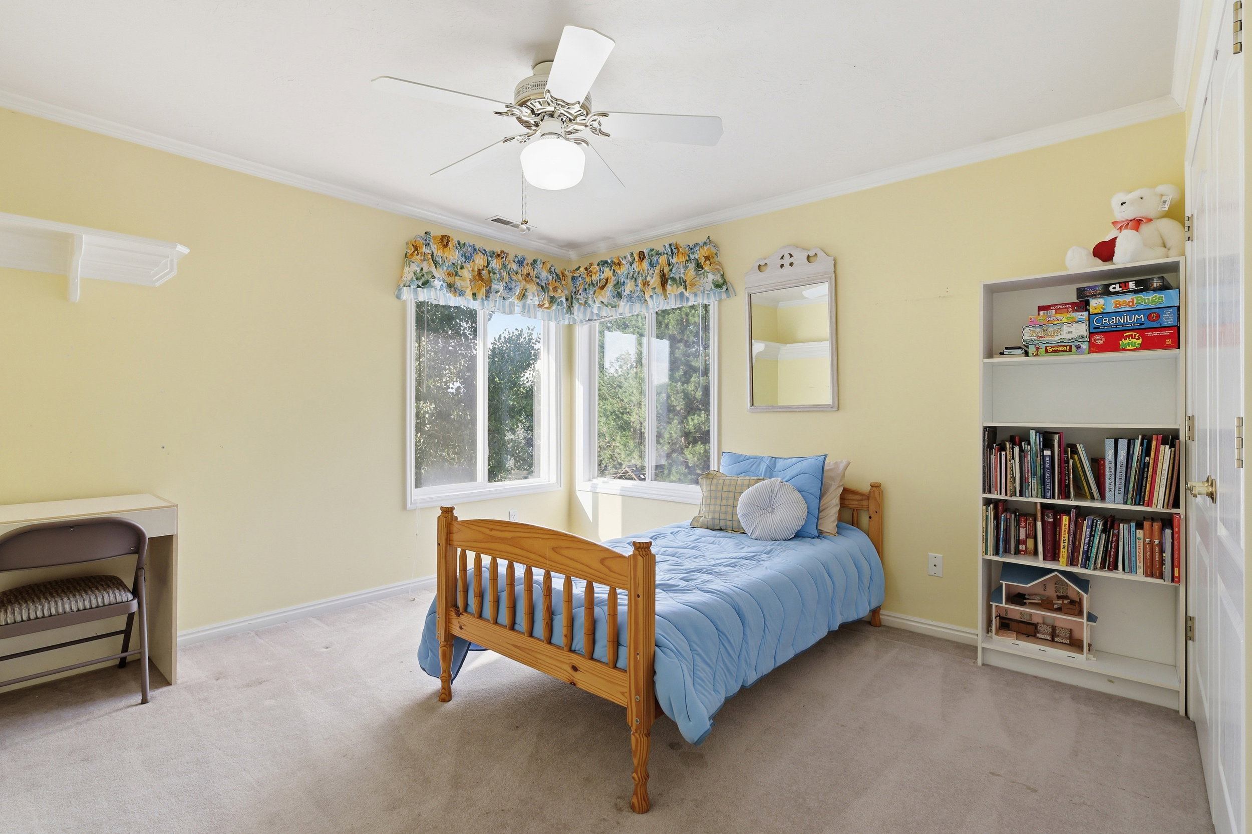Room featuring light-colored walls and carpeted flooring