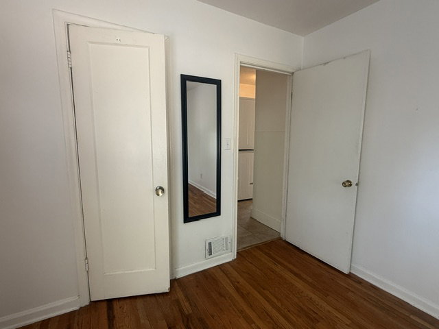 Hardwood flooring and white trim throughout