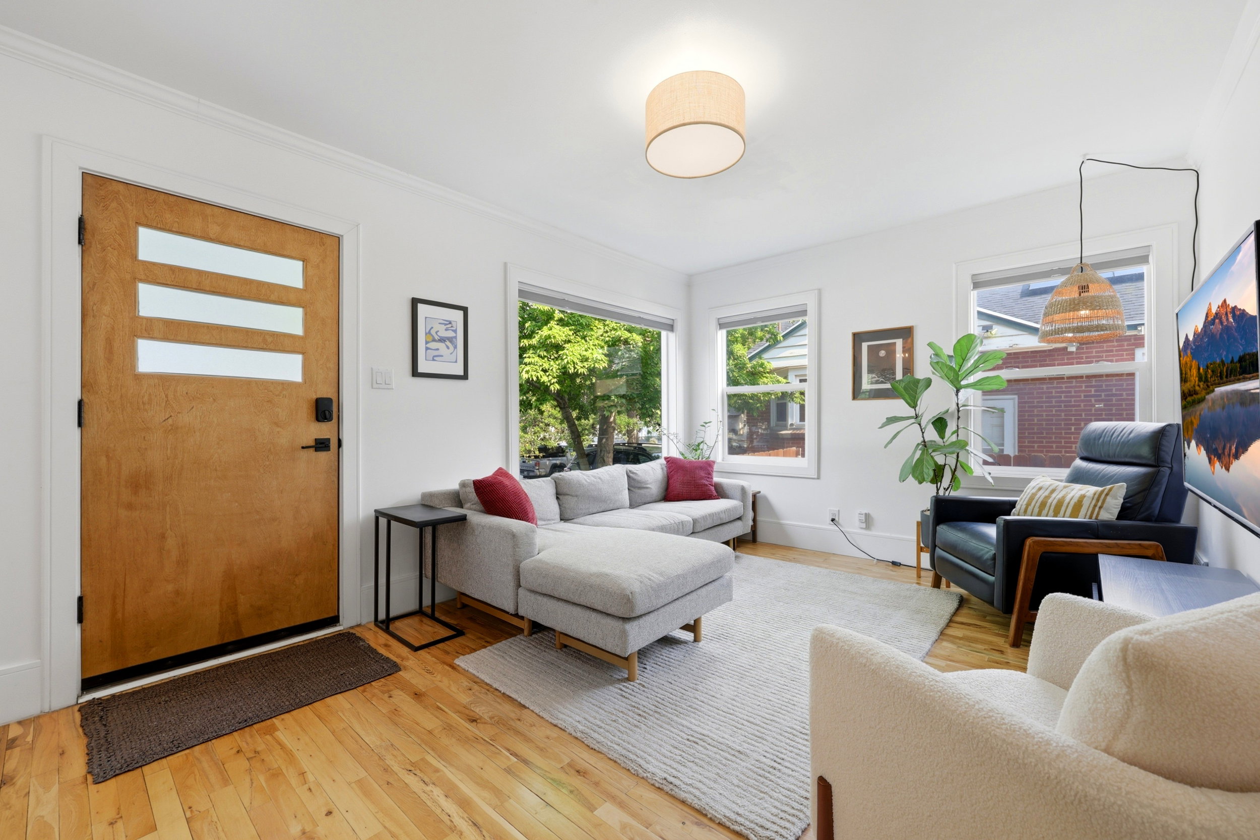 Hardwood flooring throughout the living space