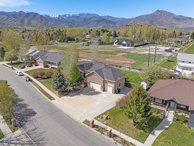 Large 3 car garage with high ceilings.  There is plenty of RV space for all your toys!