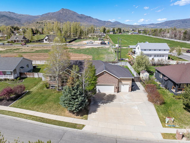 Aerial view of residential area with a mountainous background