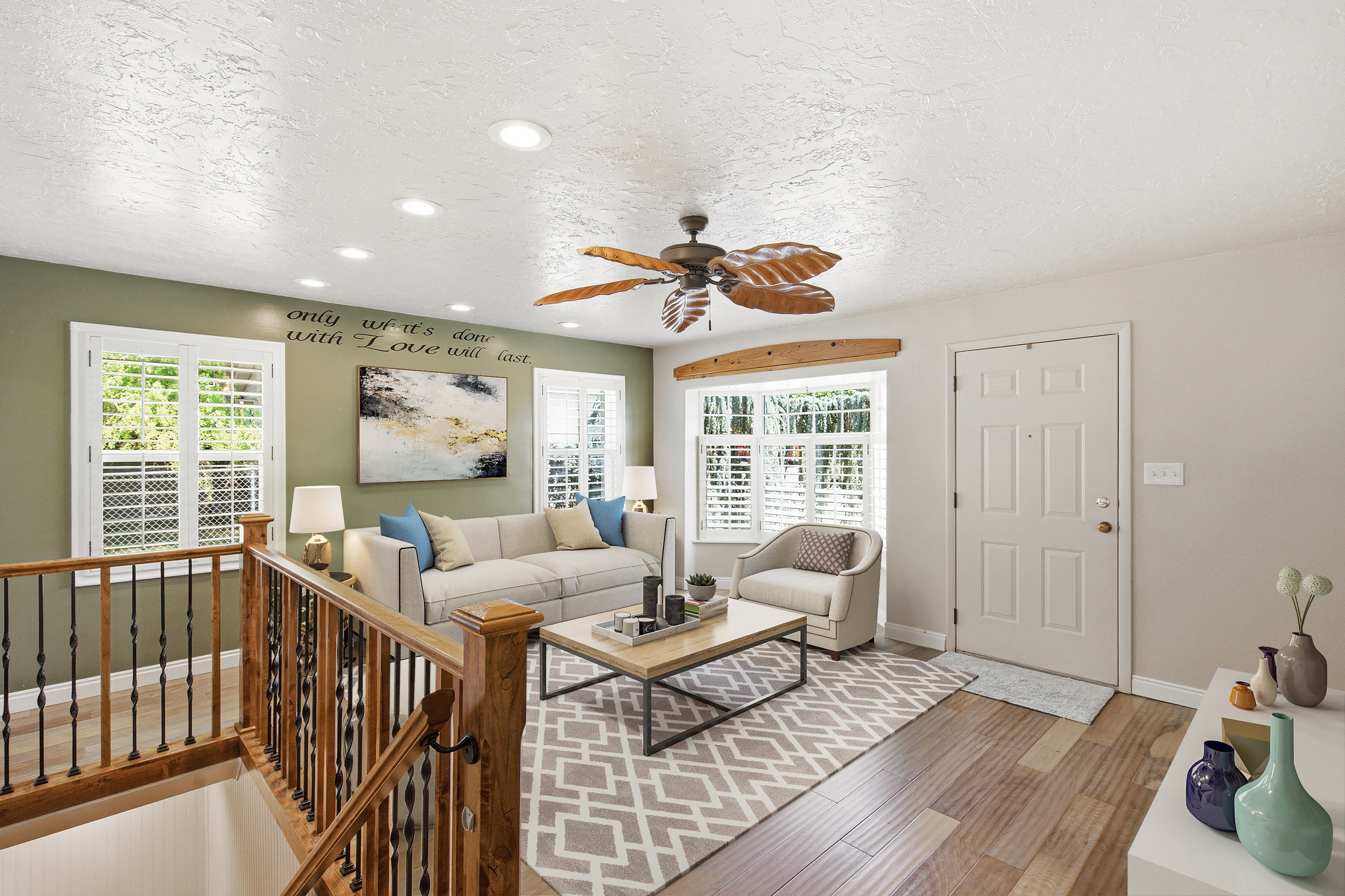 Living area featuring wood-finish flooring, recessed lighting, and a decorative ceiling fan