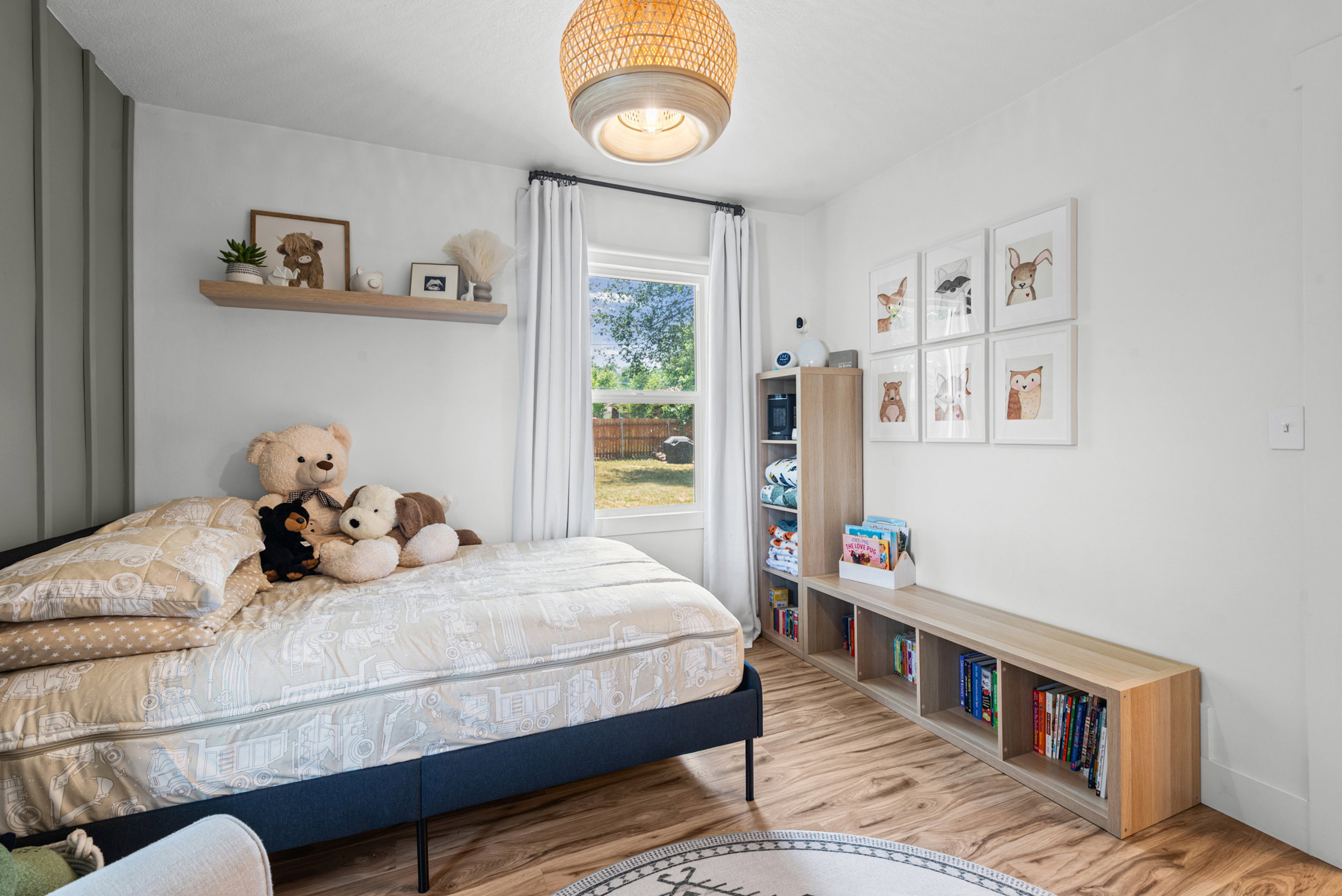 Well-lit room with wood-finish flooring