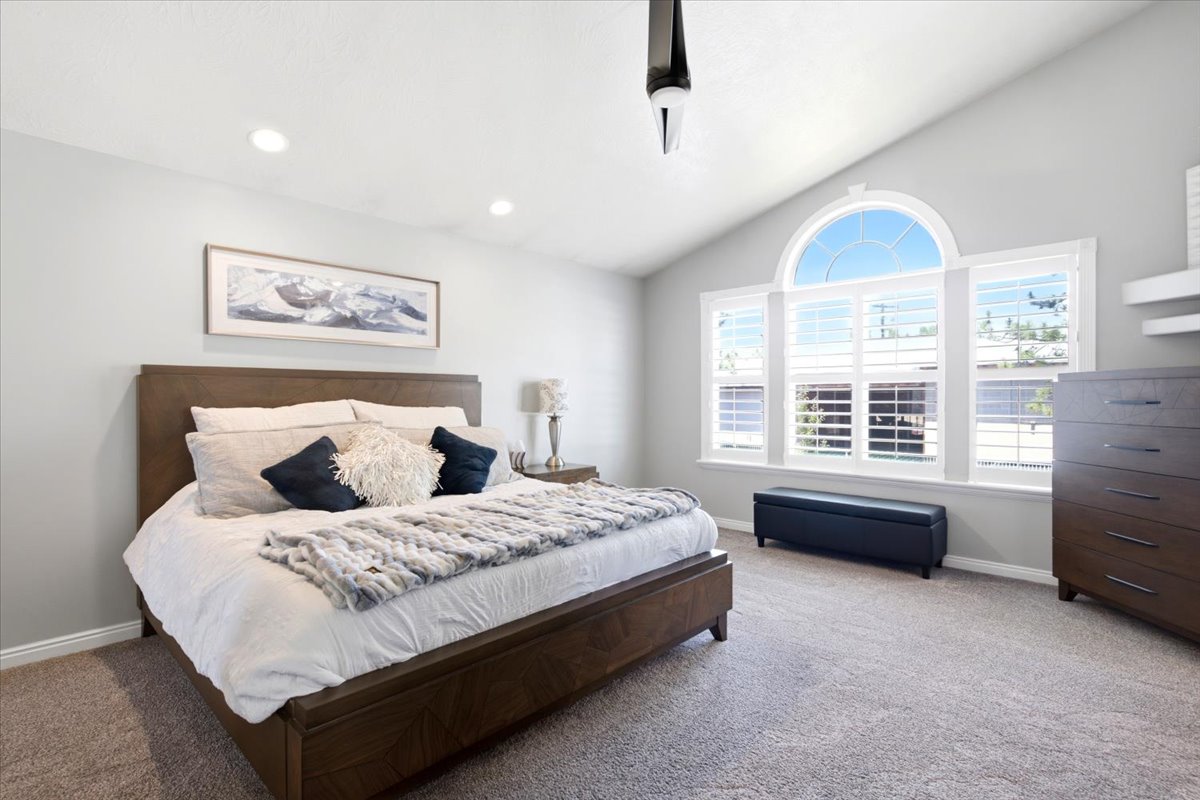 Primary suite with vaulted ceilings