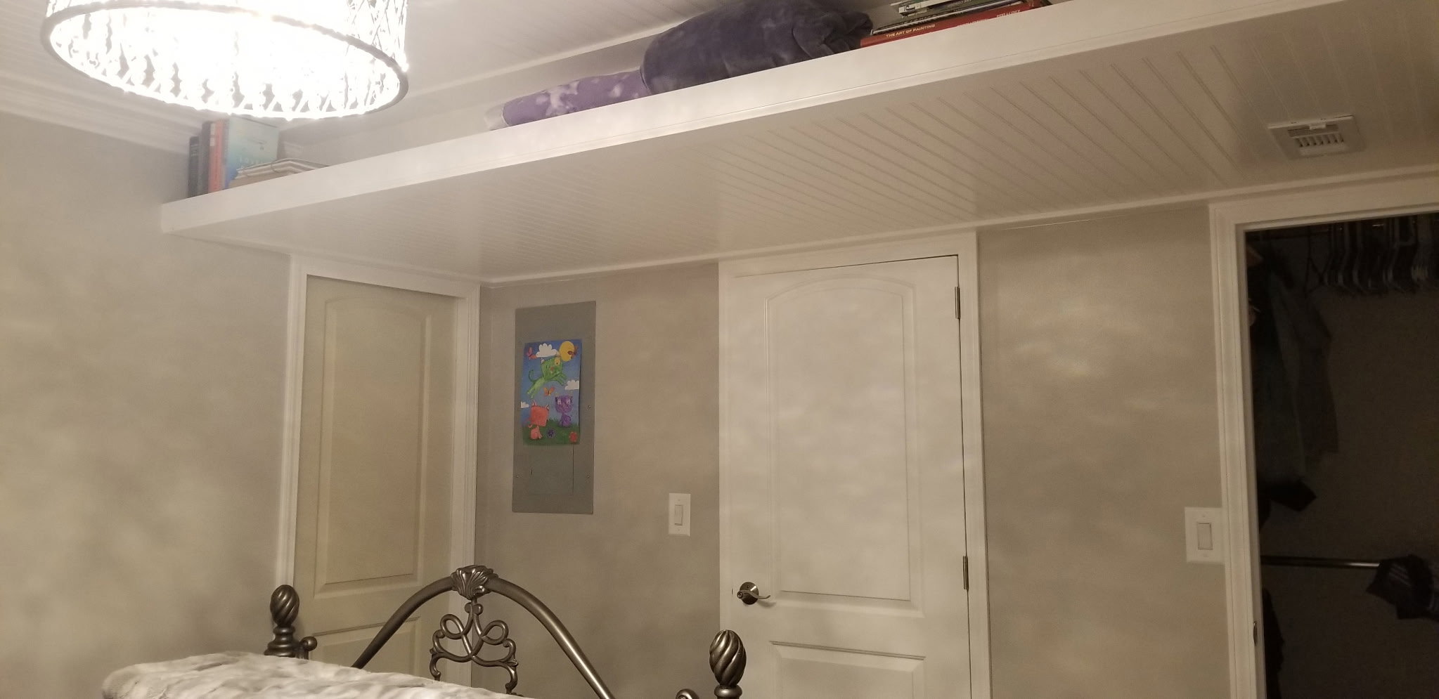 Beadboard ceiling treatment featuring an integrated shelf