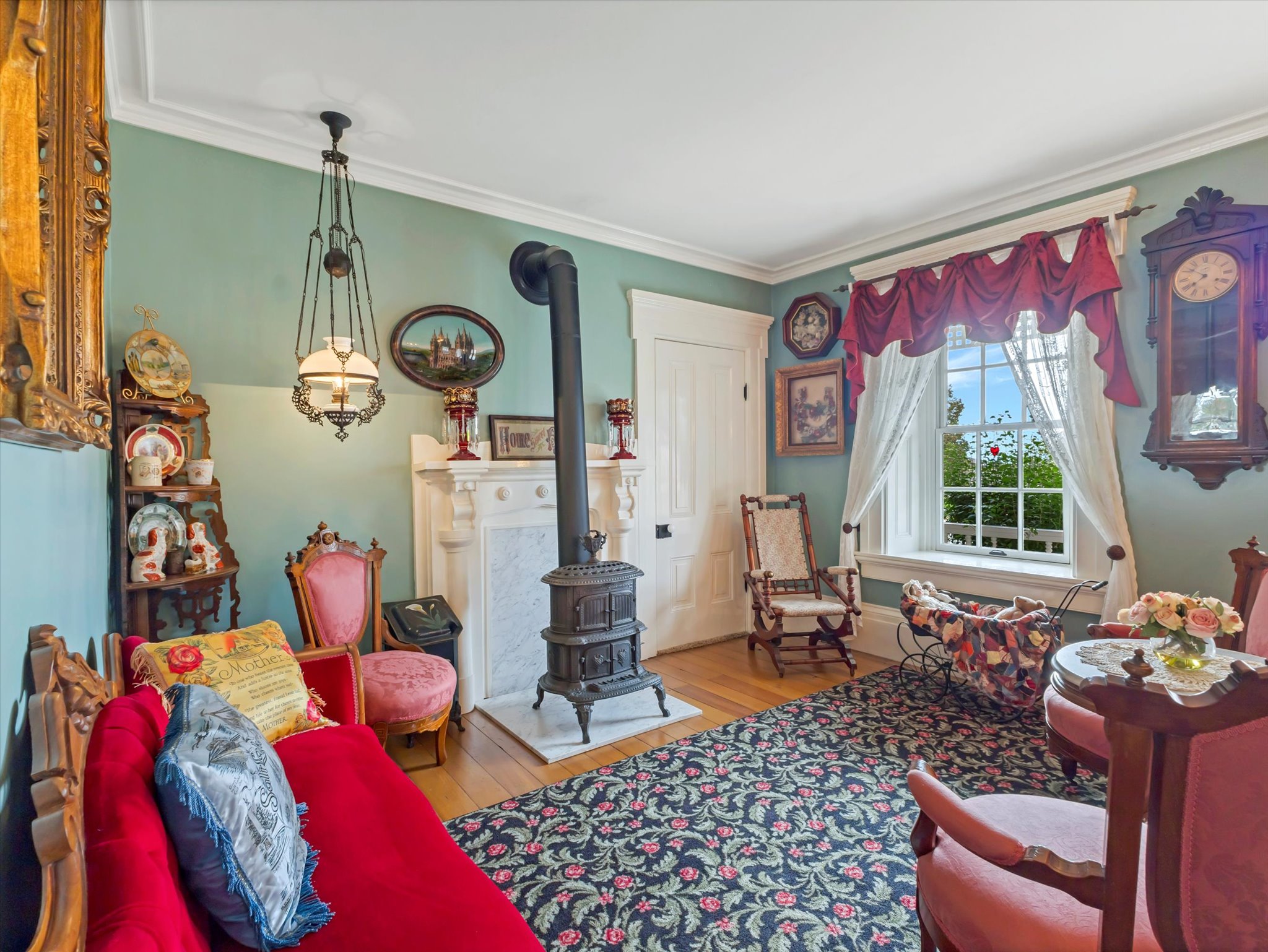Interior space featuring hardwood flooring and crown molding