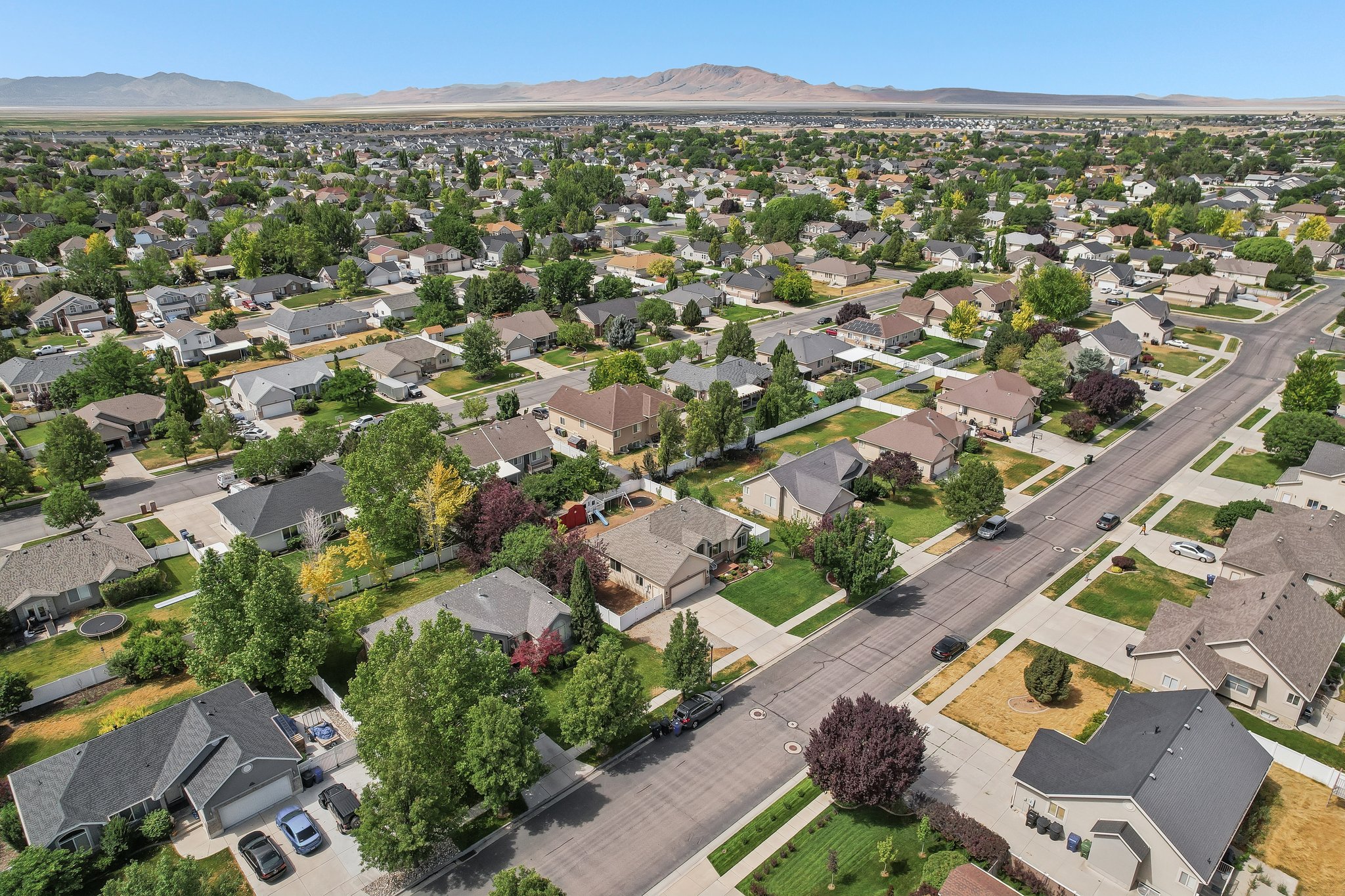 Aerial view showcasing a residential neighborhood with a consistent architectural style
