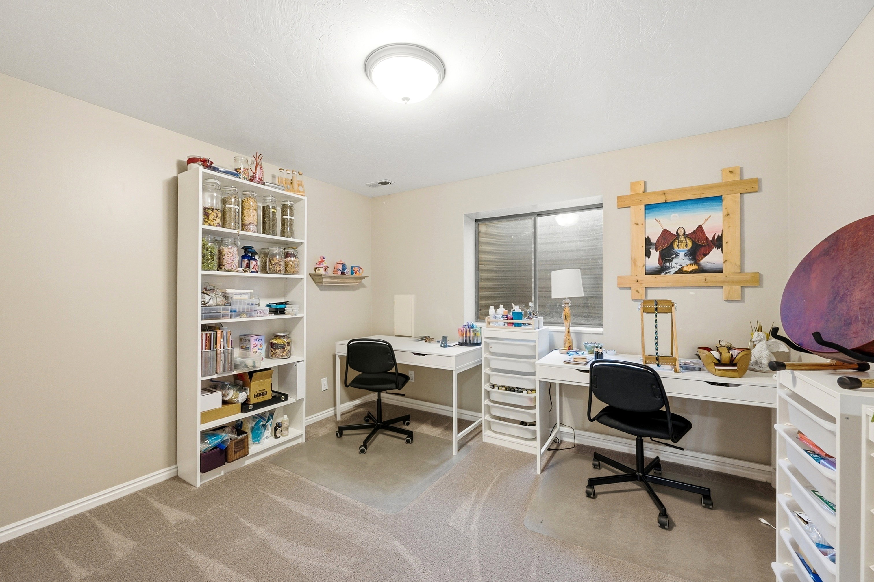 Versatile room featuring light neutral wall paint, a ceiling-mounted flush light fixture, and plush carpet flooring