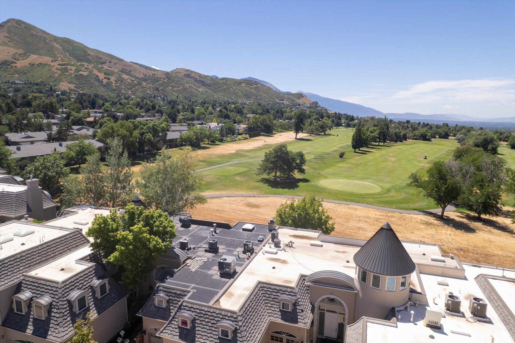 Aerial perspective showcasing the beautiful Bonneville Golf Course off the back of the home