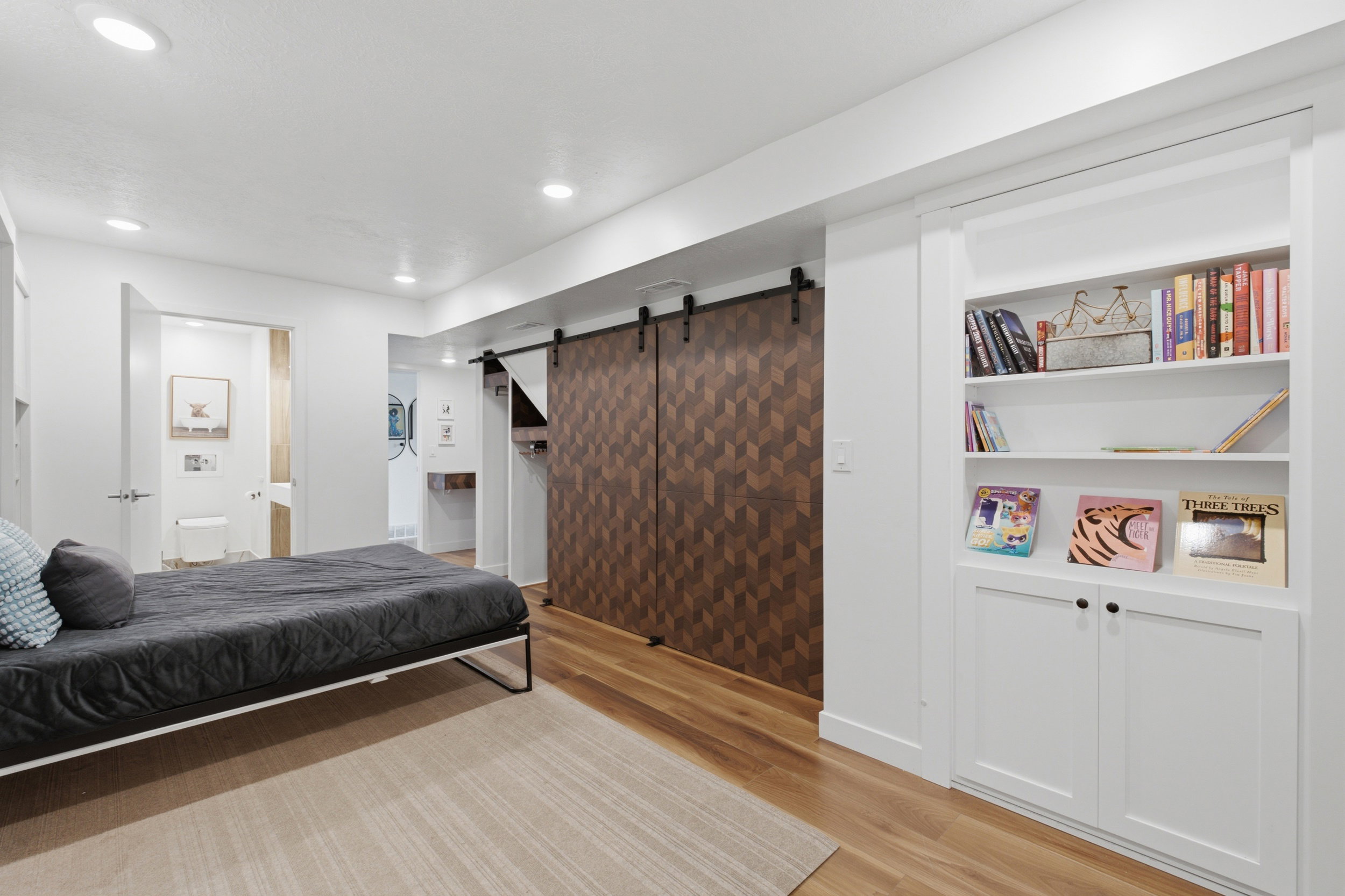 Wood-finish flooring with a textured area rug