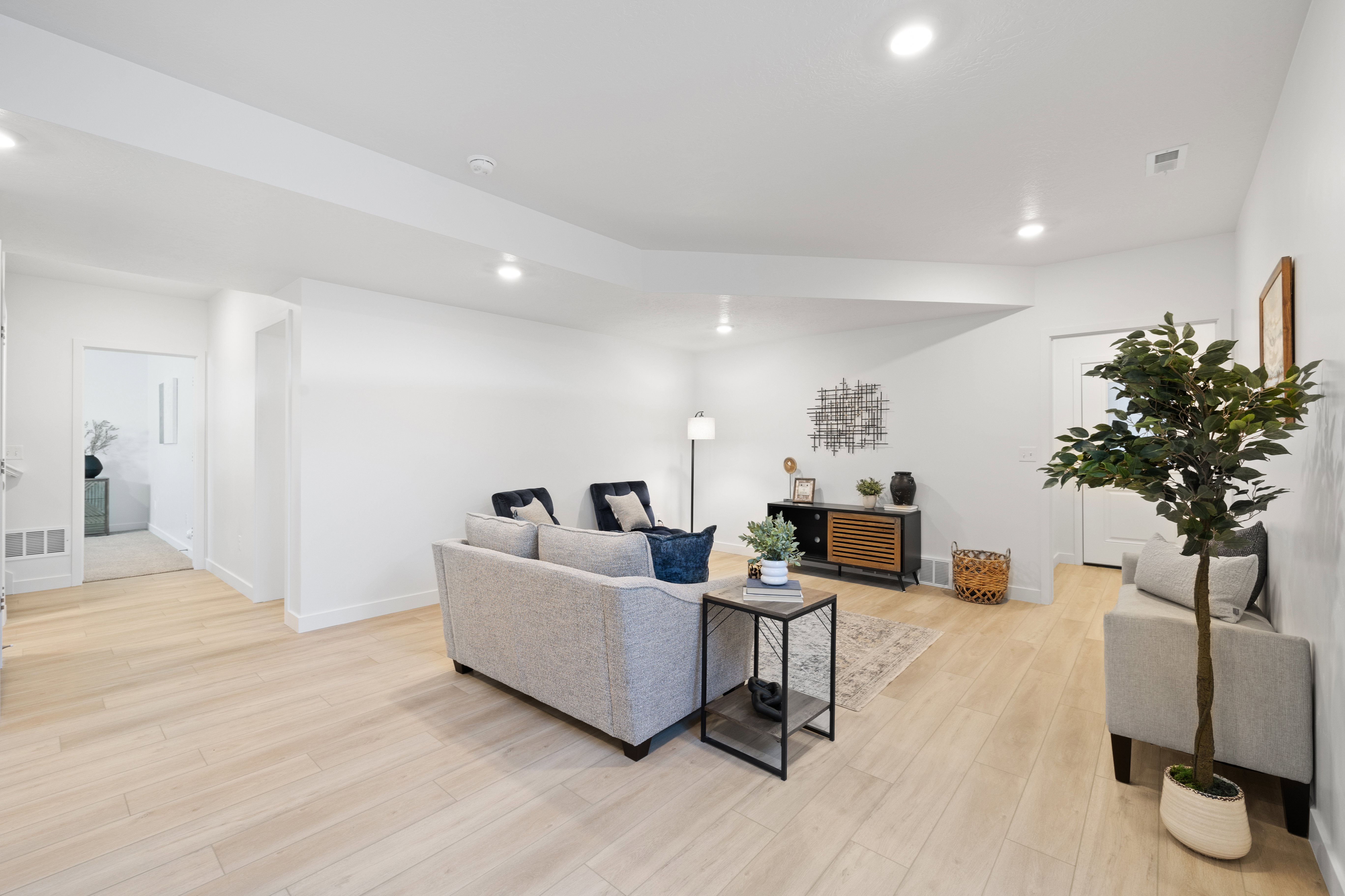 Bright interior space featuring light wood-finish flooring